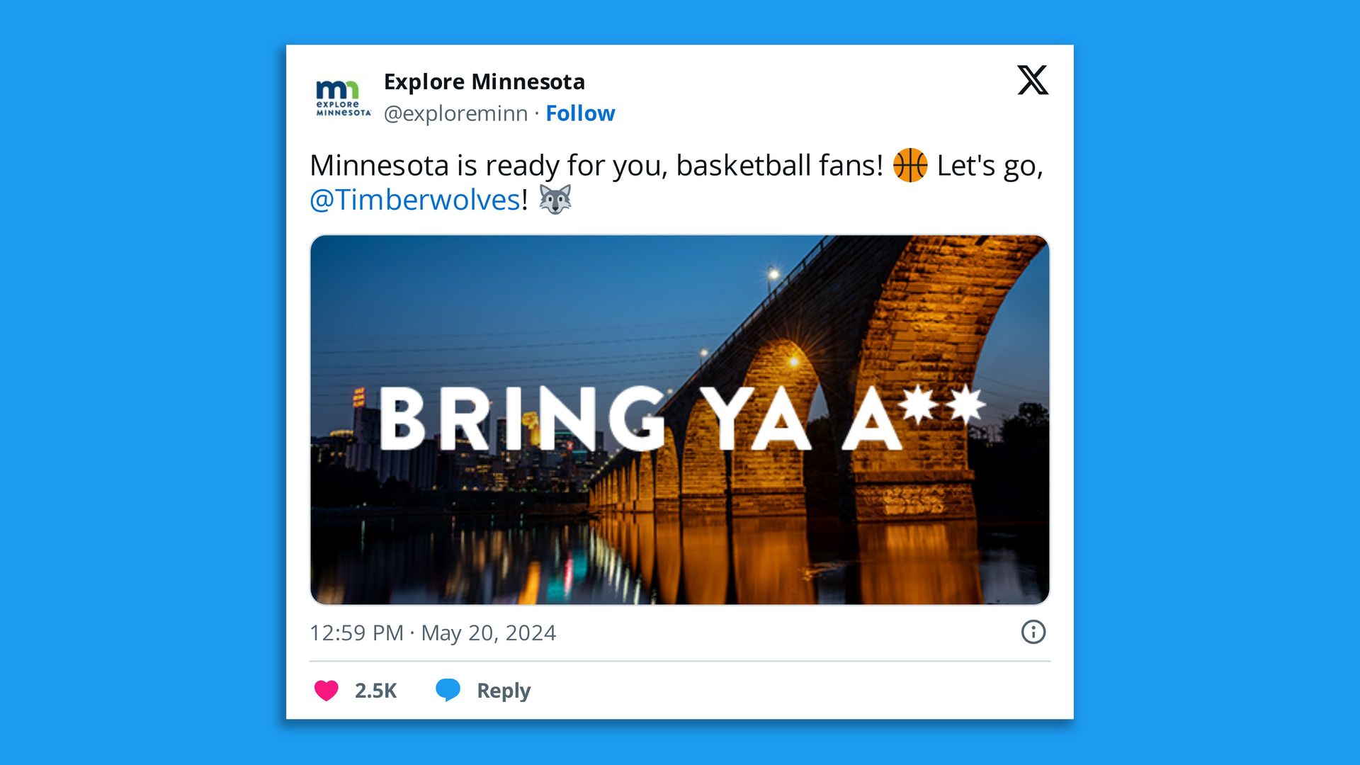 A screenshot from the social media platform "X" from the Explore Minnesota account (@exploreminn) with a picture of Minneapolis' Stone Arch Bridge and the large caption "Bring Ya A**" with the asterisks in "A**" shaped like Minnesota's eight-pointed L'Etoile du Nord logo.