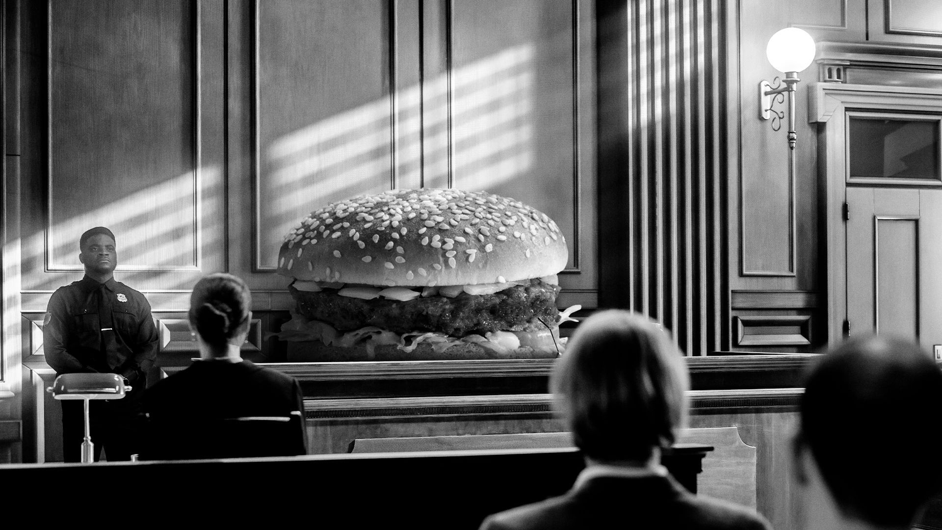 Illustration of a cheeseburger testifying in court