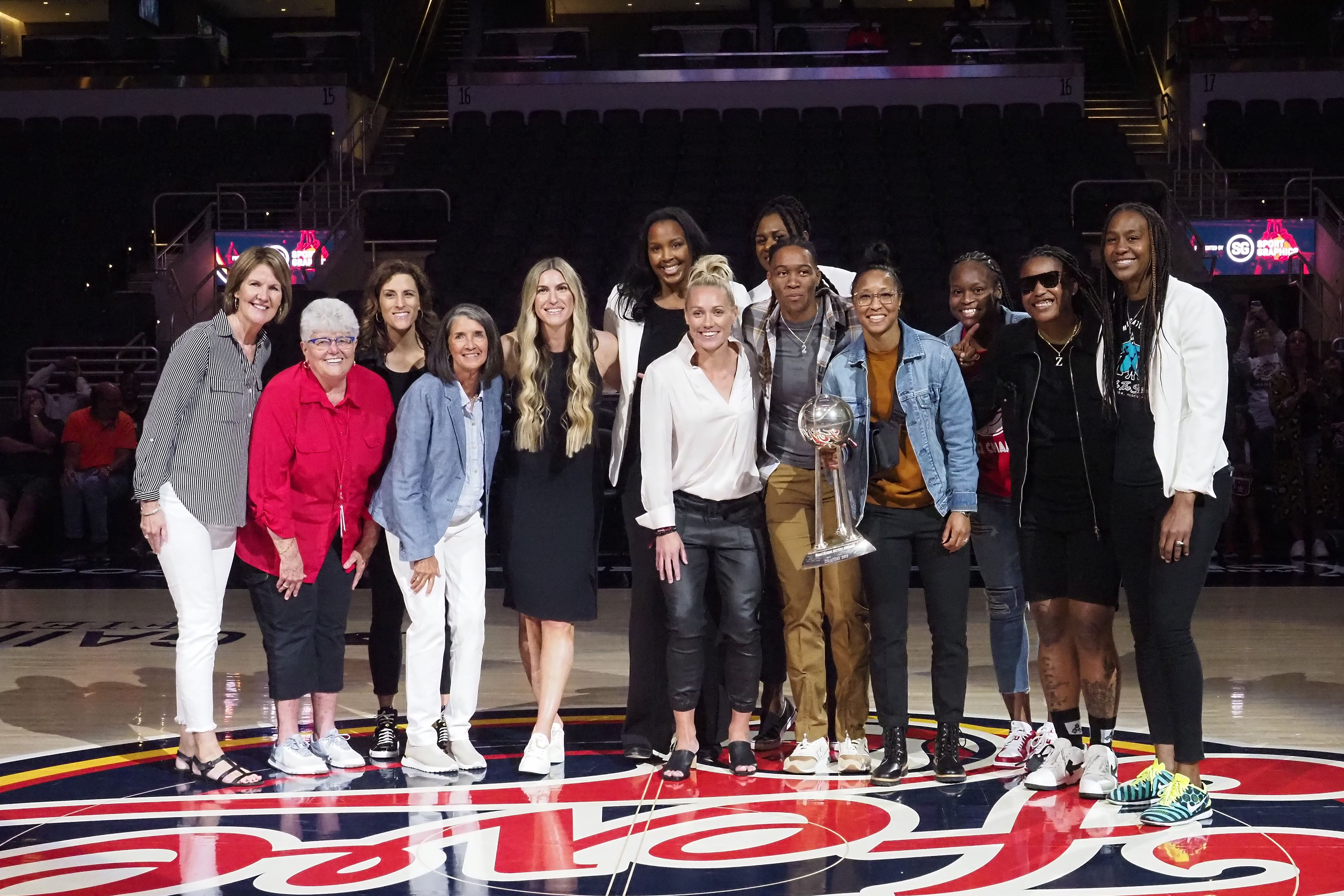  The members of the 2012 Indiana Fever Championship winning team celebrate their 10th anniversary win during the game between the Connecticut Sun and the Indiana Fever on May 22, 2022 at Gainbridge Fieldhouse in Indianapolis, Indiana. 