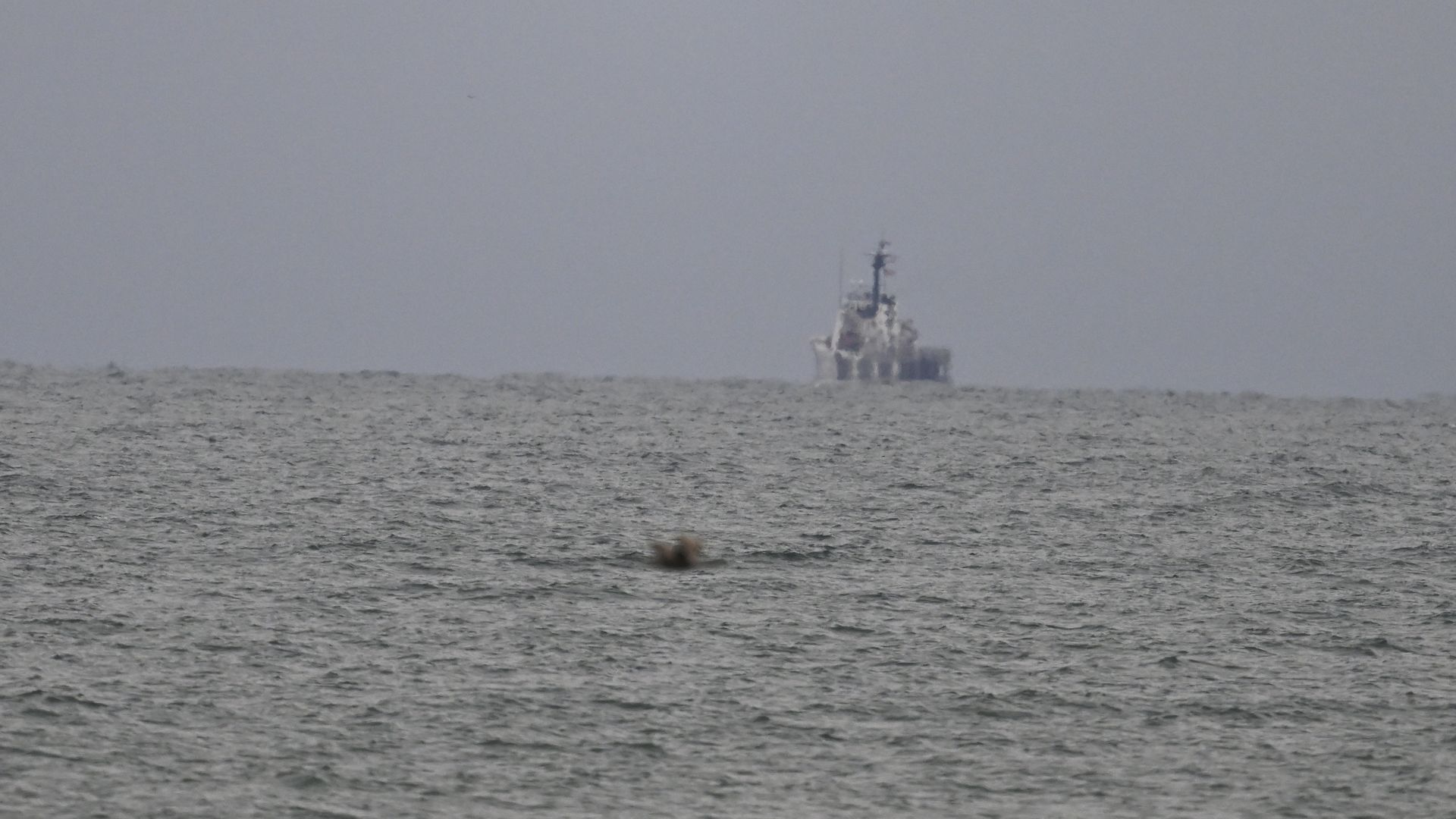  A ship scans the sea during efforts to retrieve and recover the Chinese spy balloon on Sunday.