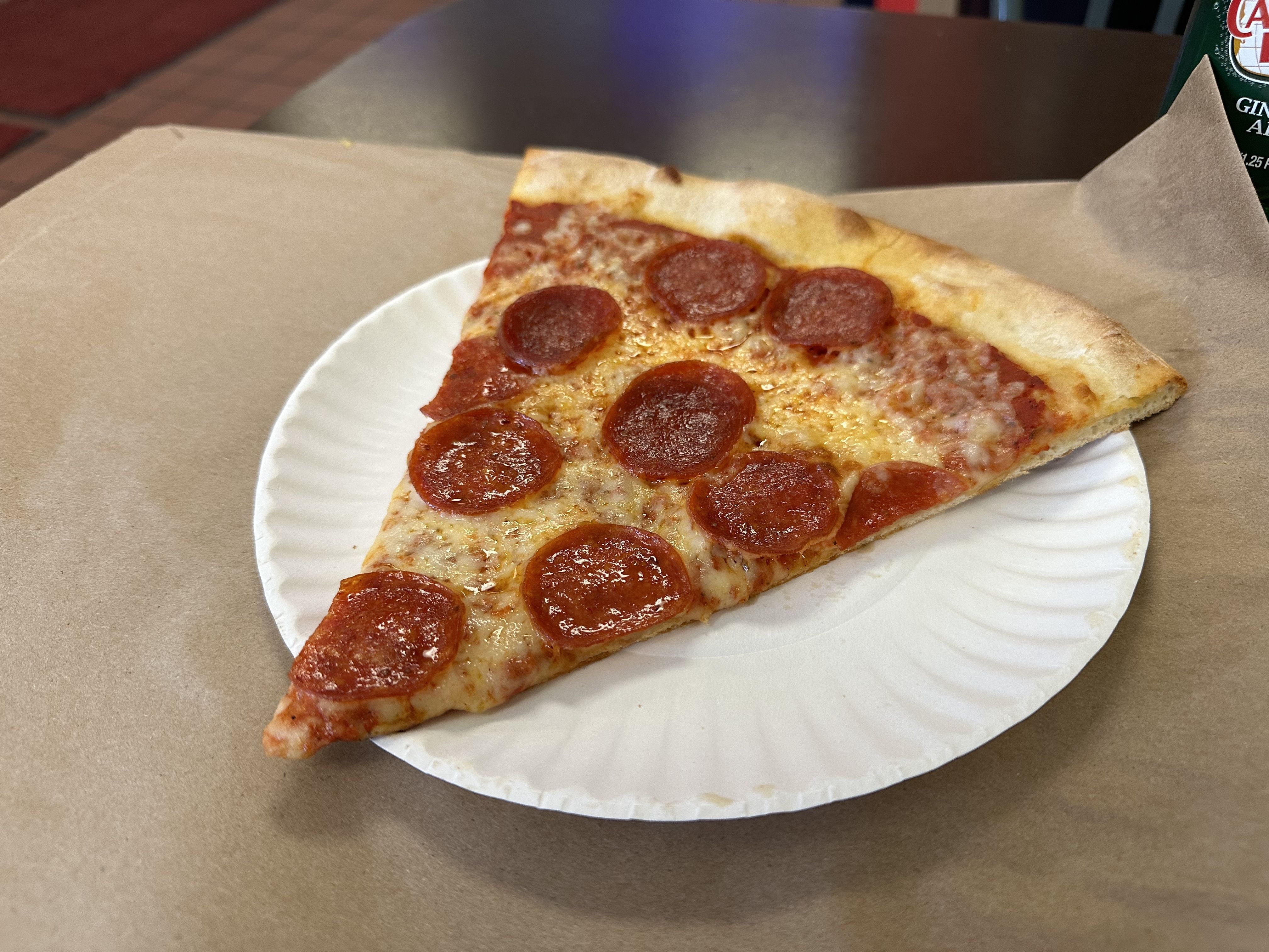 A slice of pepperoni pizza.
