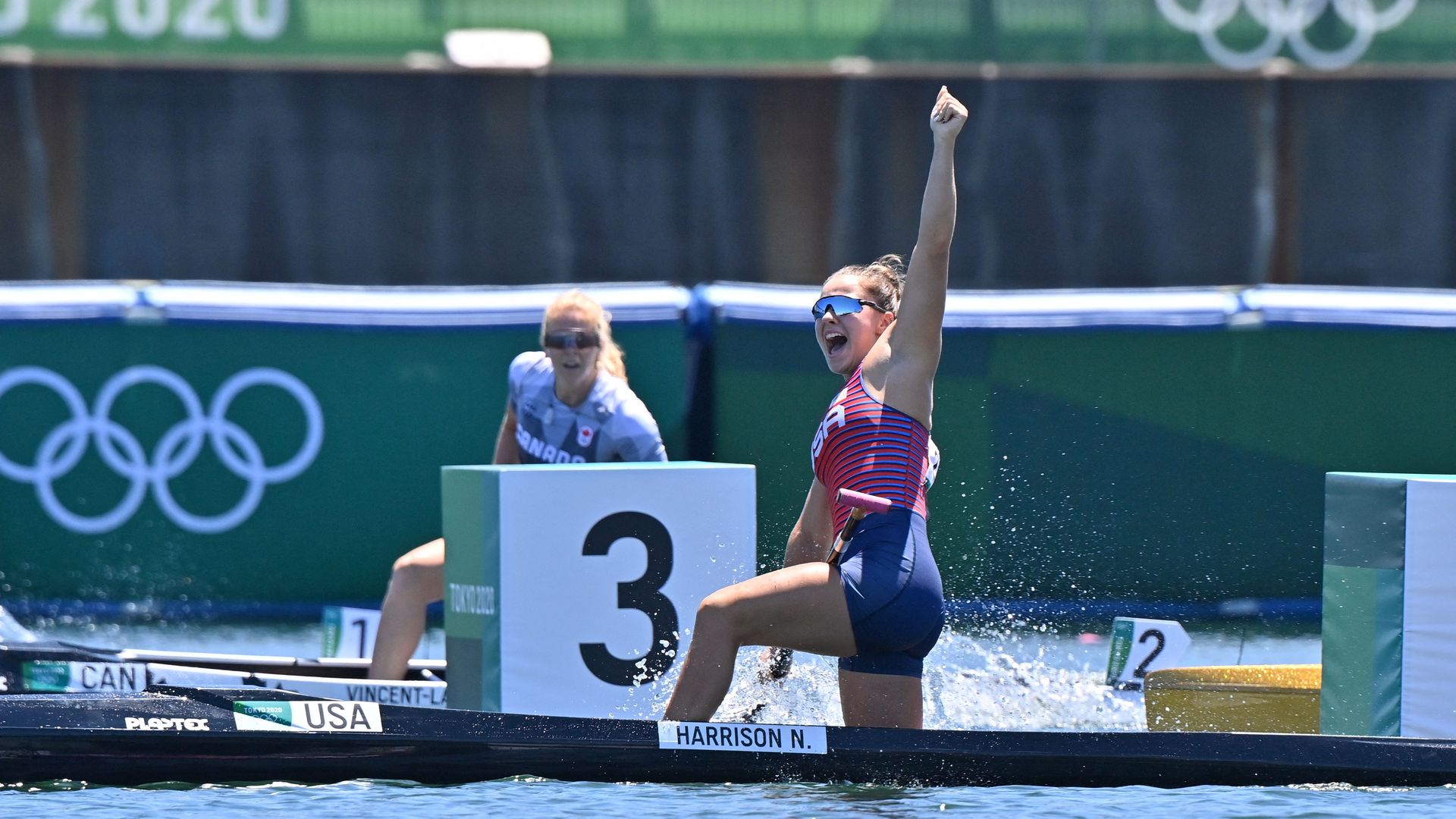 USA's Nevin Harrison celebrates after winning gold in the women's canoe single 200m final during the Tokyo 2020 Olympic Games at Sea Forest Waterway in Tokyo on August 5