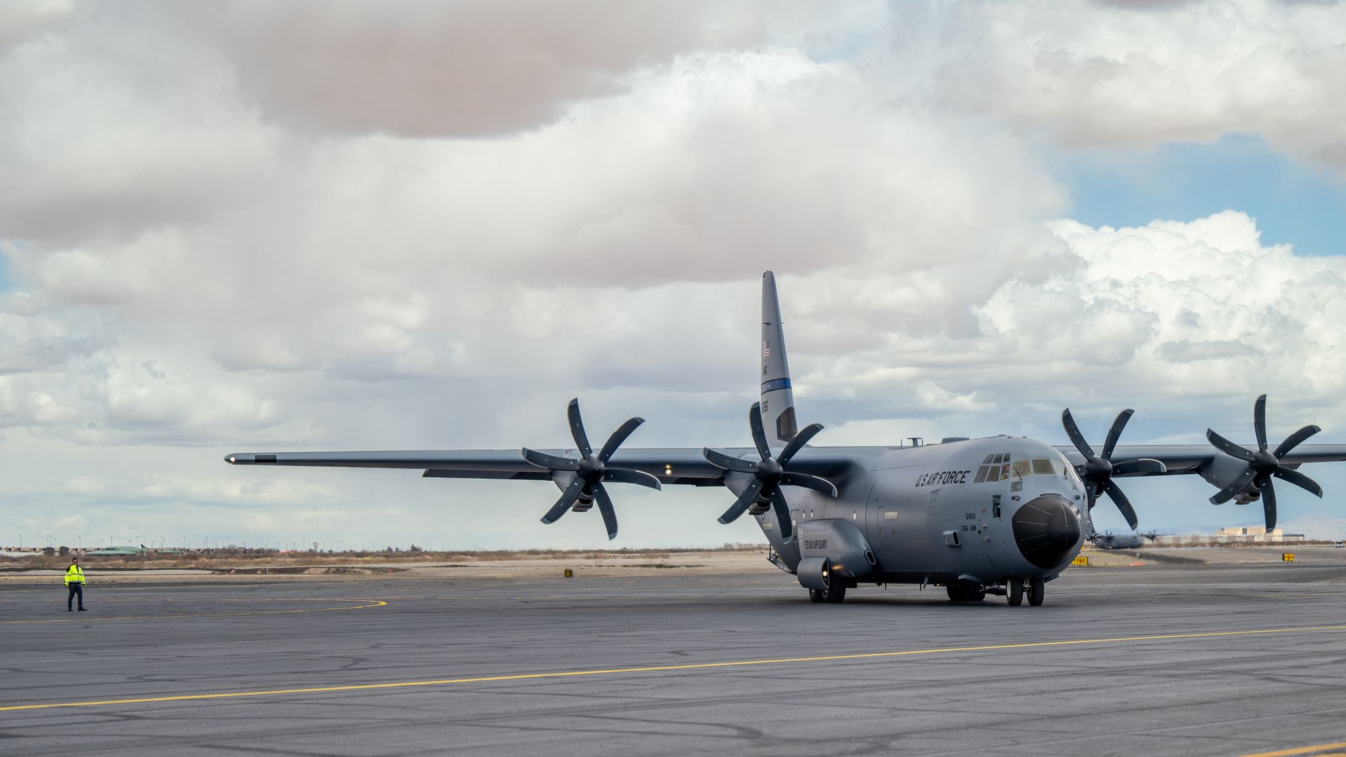 Texas National Guard members disembark from a U.S. Air Force transport plane at Million Air El Paso airport in El Paso, Texas, in 2024.