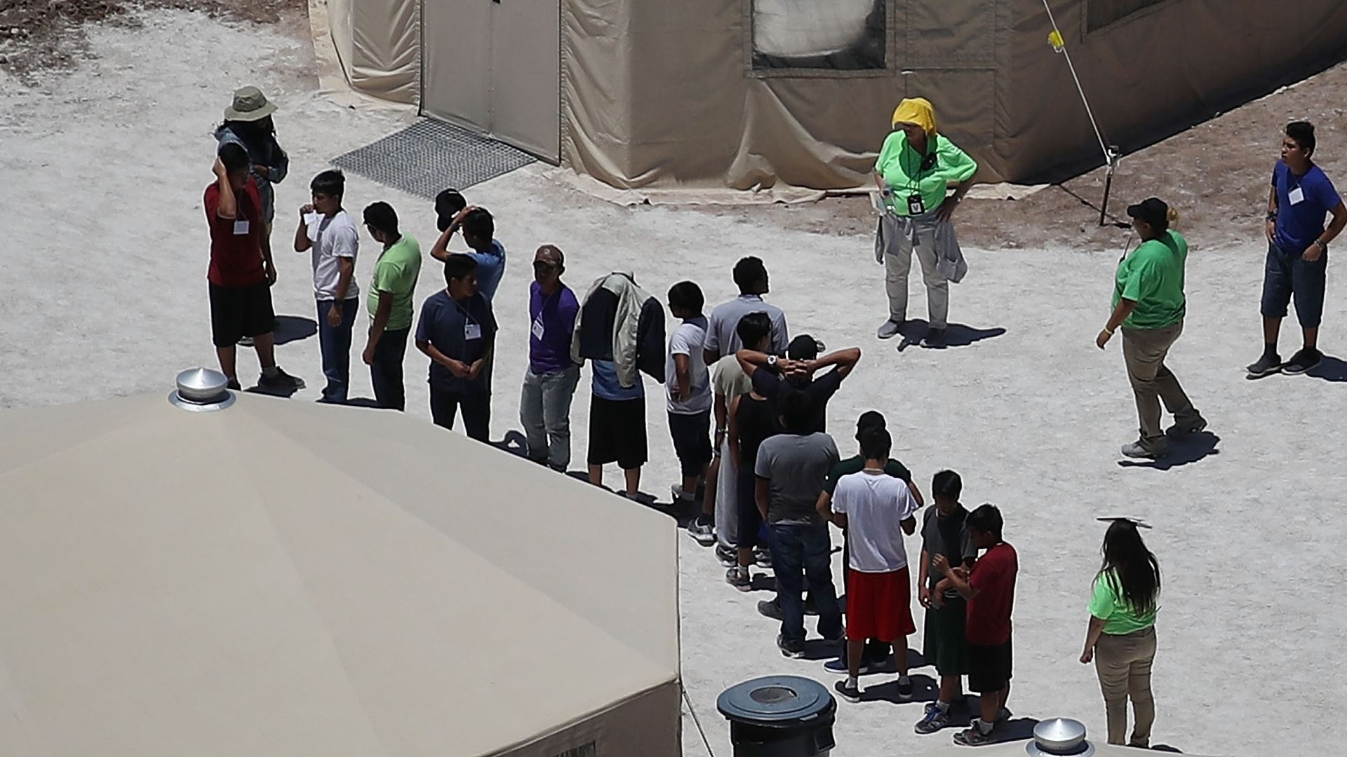 boys in tent camp shelter
