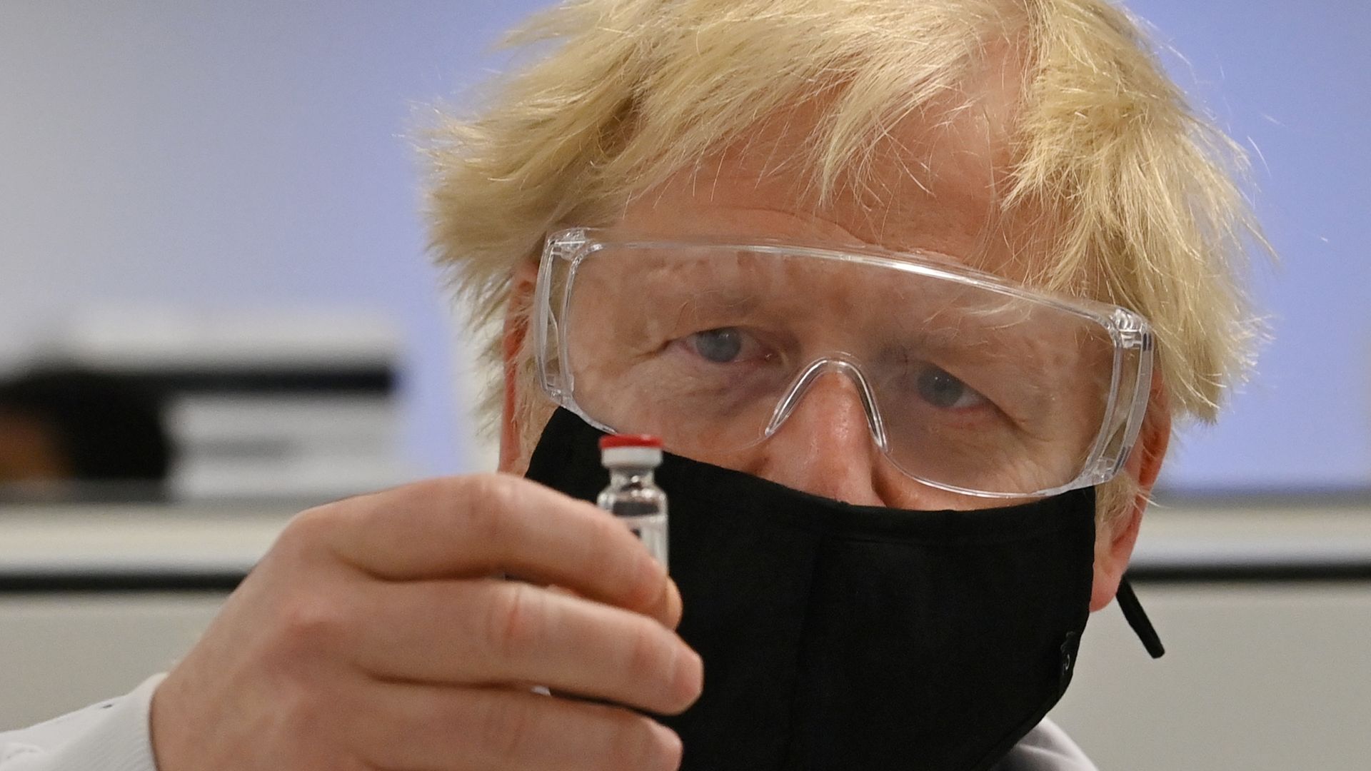  British Prime Minister Boris Johnson  with a vial of the AstraZeneca/Oxford University COVID-19 vaccine at Wockhardt's pharmaceutical manufacturing facility on November 30, 2020 in Wrexham, Wales.