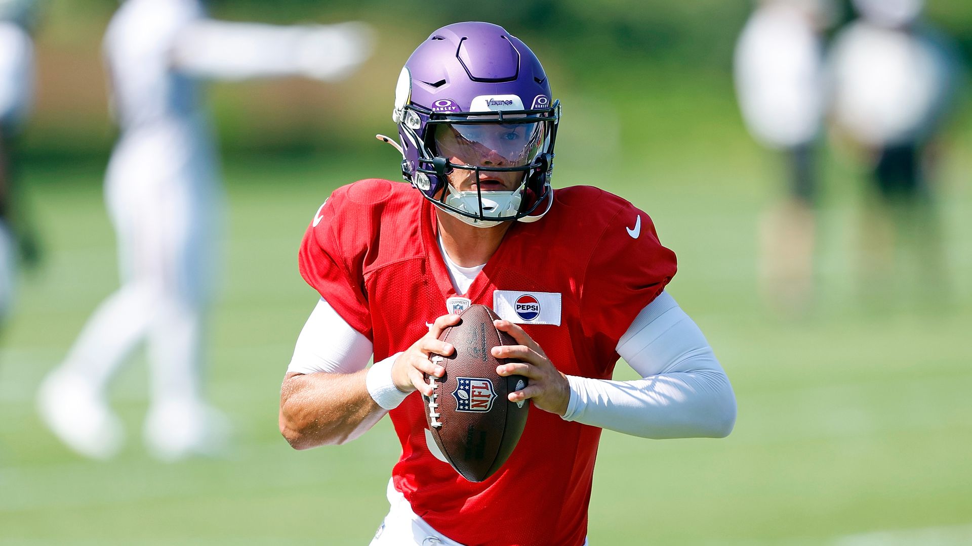 J.J. McCarthy of the Minnesota Vikings participates in a drill during training camp on Aug. 2.