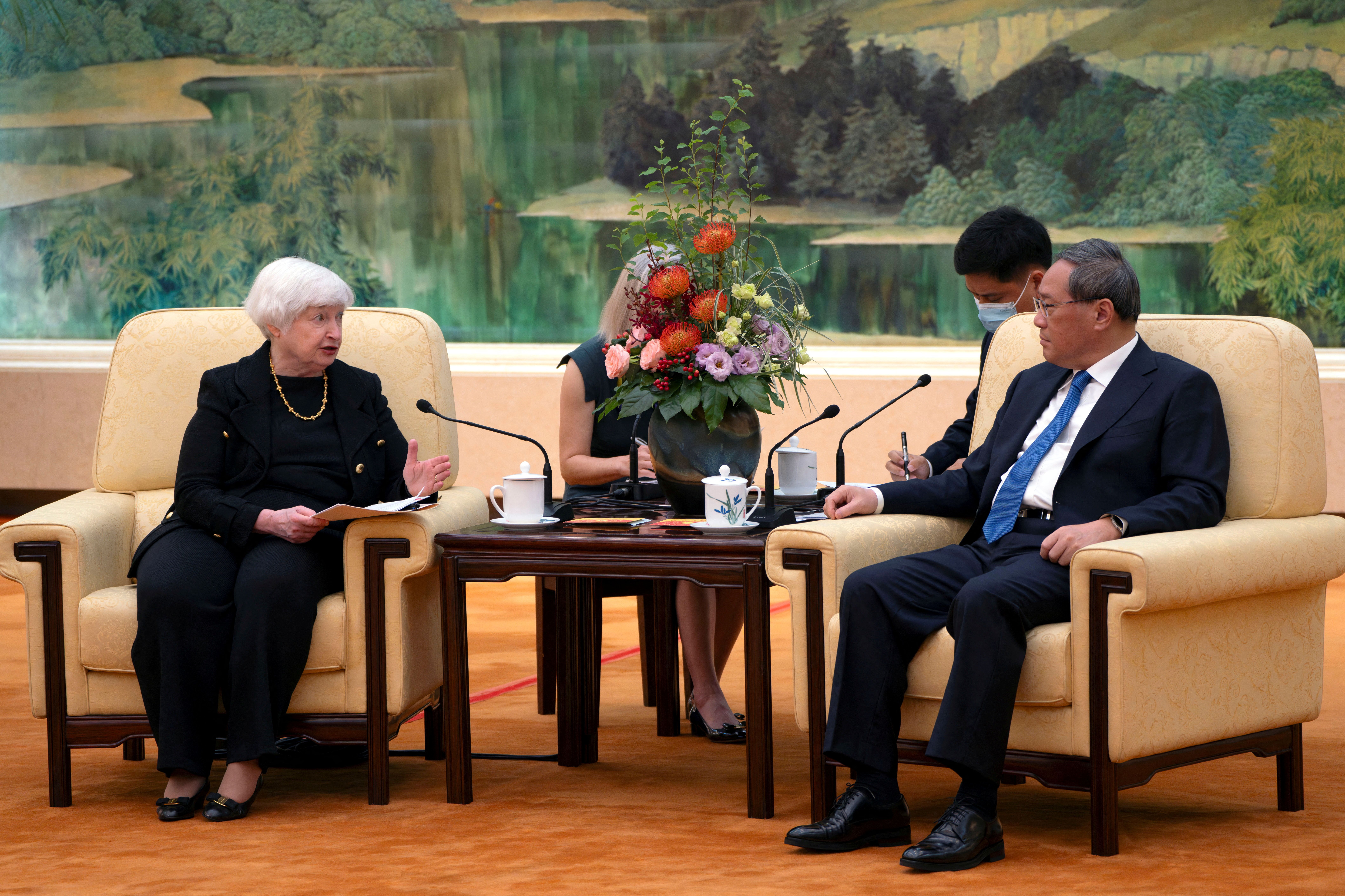Treasury Secretary Janet Yellen, left, speaks as Chinese Premier Li Qiang, right, listens during a meeting at the Great Hall of the People in Beijing, China, Friday, July 7, 2023.