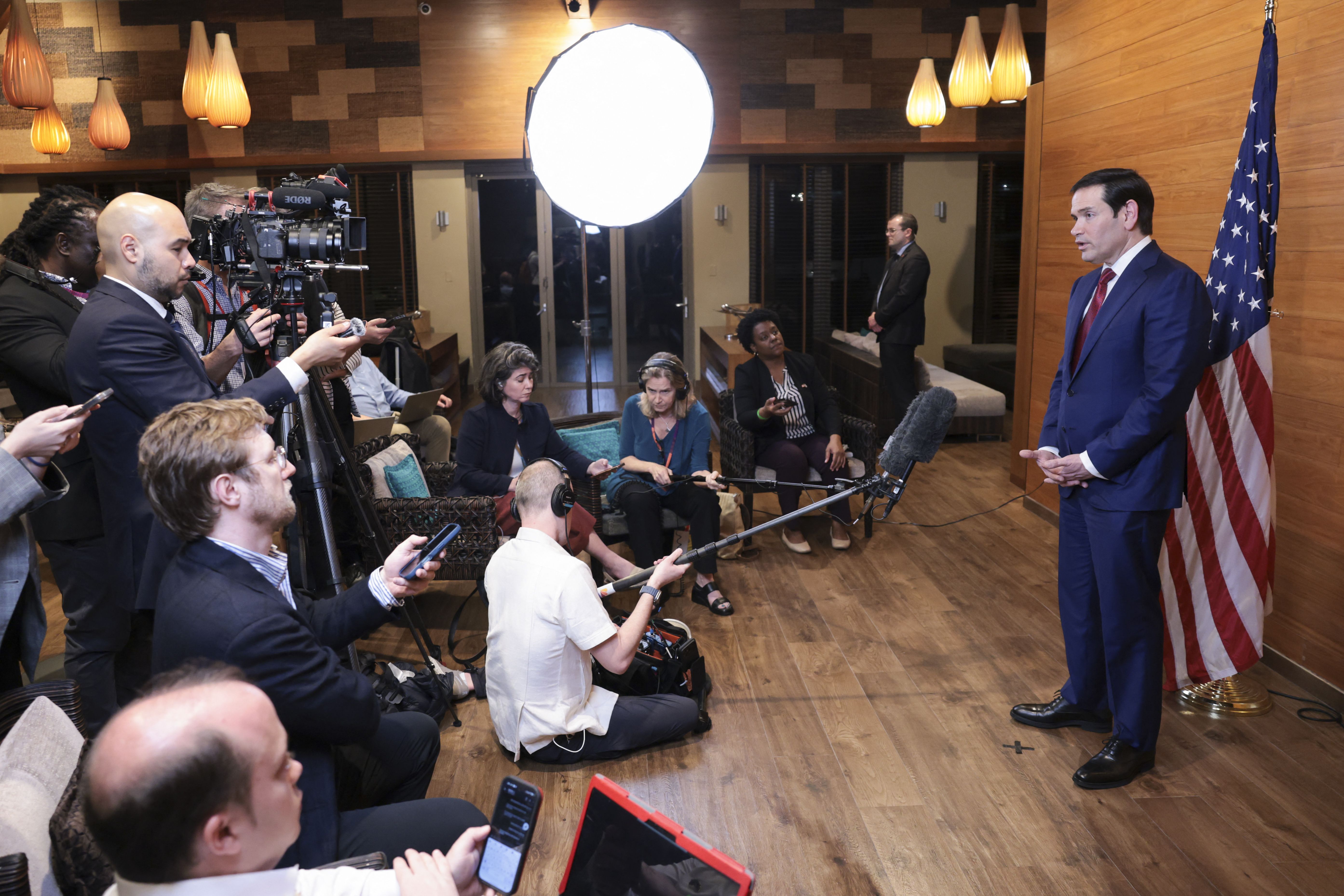 US Secretary of State Marco Rubio speaks to reporters in a departure lounge before returning to Washington following meetings with Caribbean Community (CARICOM) leaders, at Robert L. Bradshaw International Airport in Basseterre, Saint Kitts and Nevis on February 25, 2026. Rubio met with Caribbean le