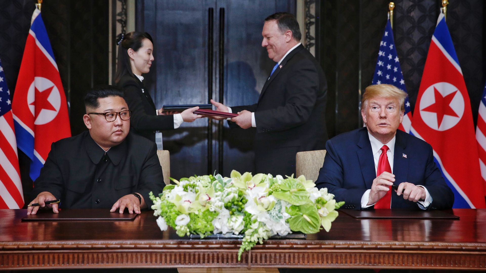 North Korean leader Kim Jong-un with U.S. President Donald Trump during their historic summit at the Capella Hotel on Sentosa island on June 12, 2018 in Singapore