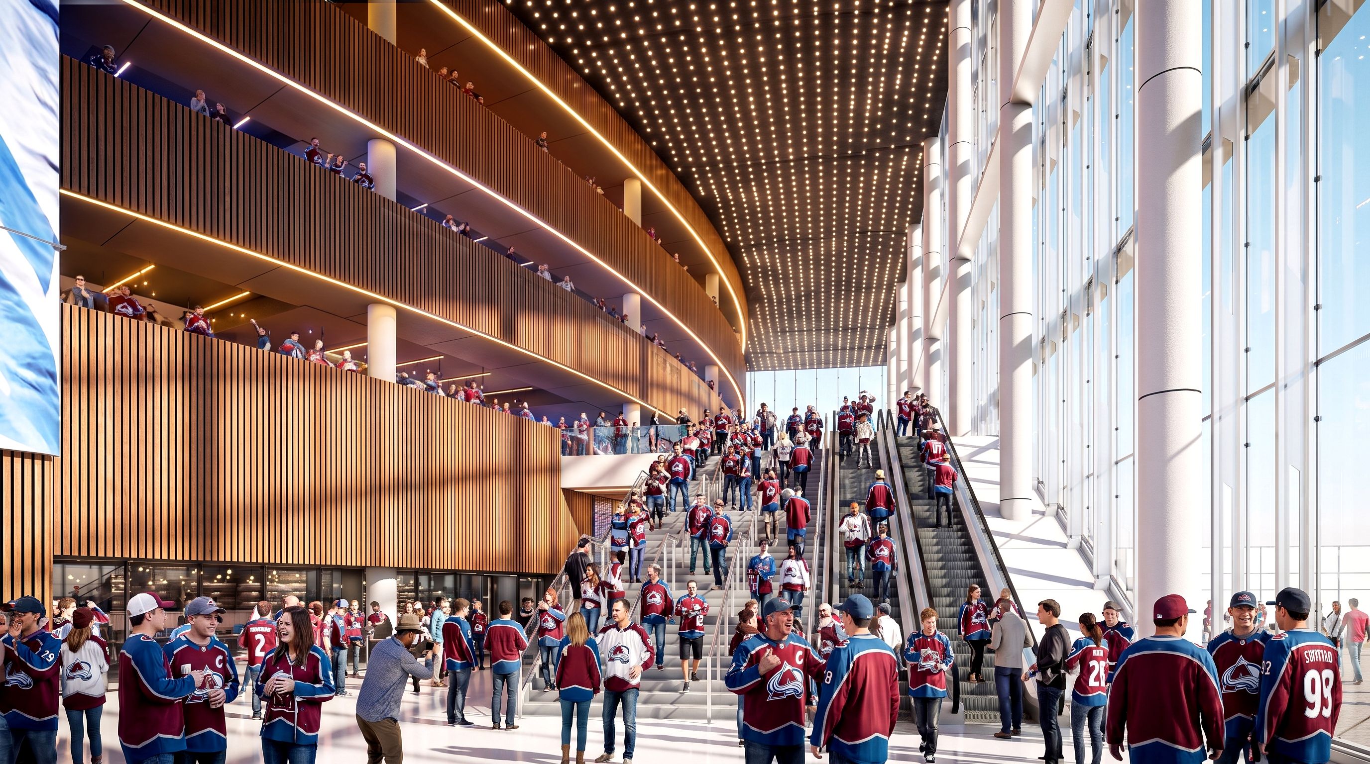 Bright, multi-level atrium filled with fans in maroon hockey jerseys. Left: layered wooden slat balconies; center: escalators and warm linear lighting; right: glass walls and white columns.