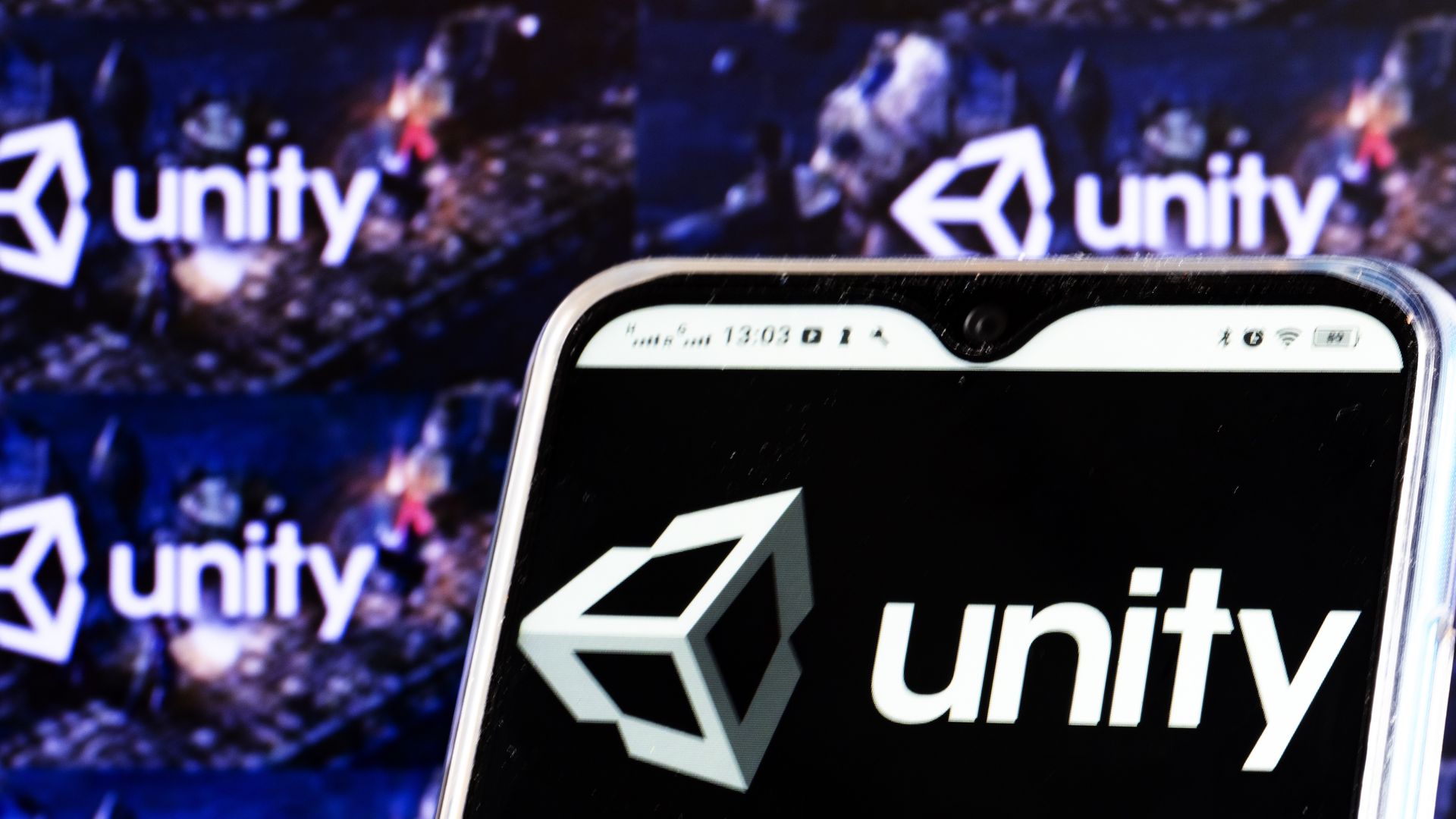 Photo of a phone showing the Unity logo