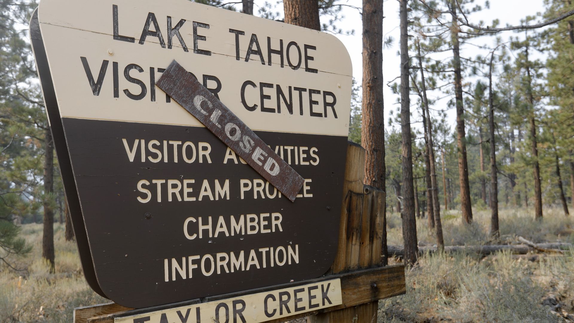  A sign is seen near Taylor Creek along Highway 89 as residents remain evacuated due to the Caldor Fire 
