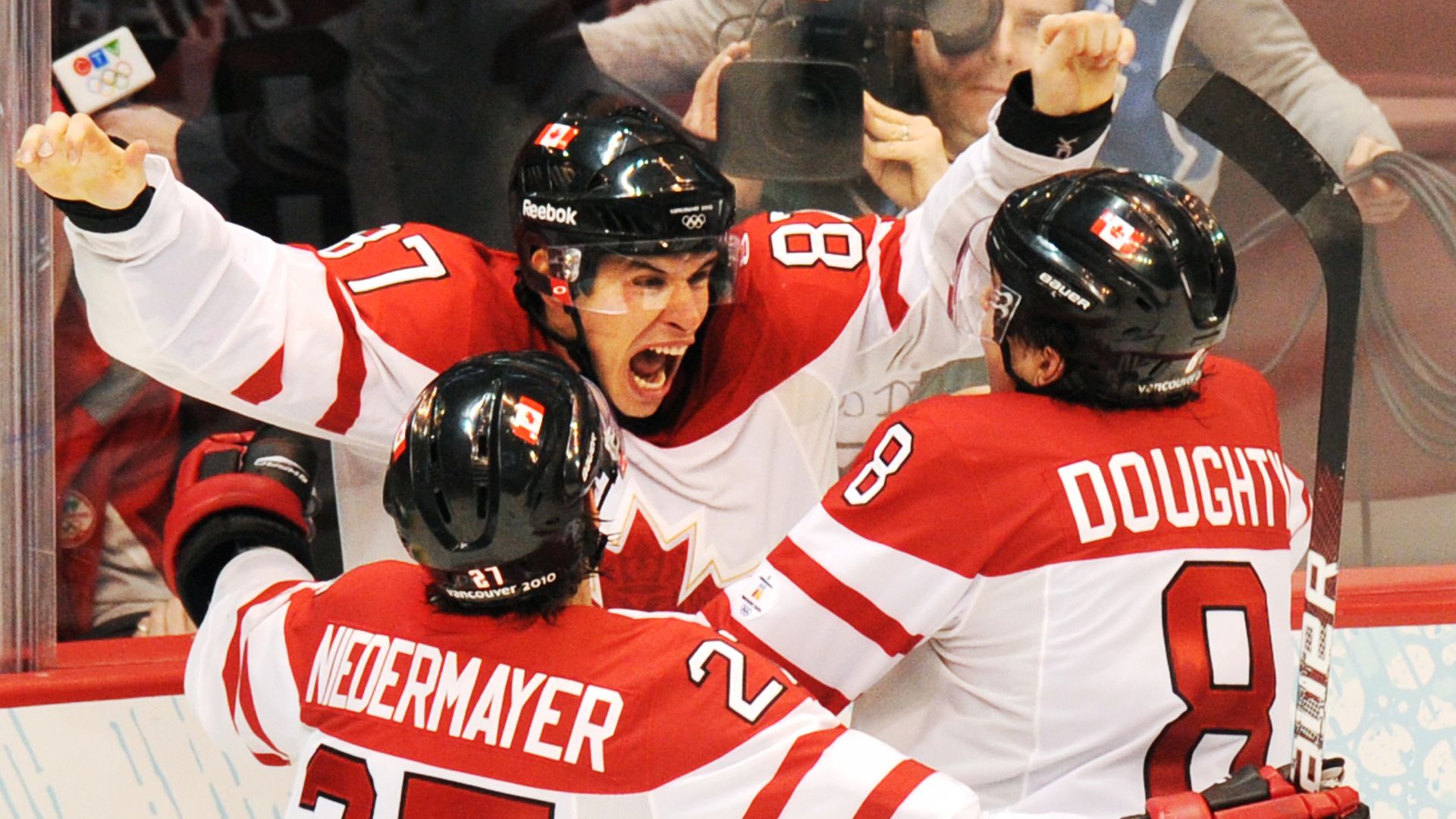 Sidney Crosby celebrating with teammates