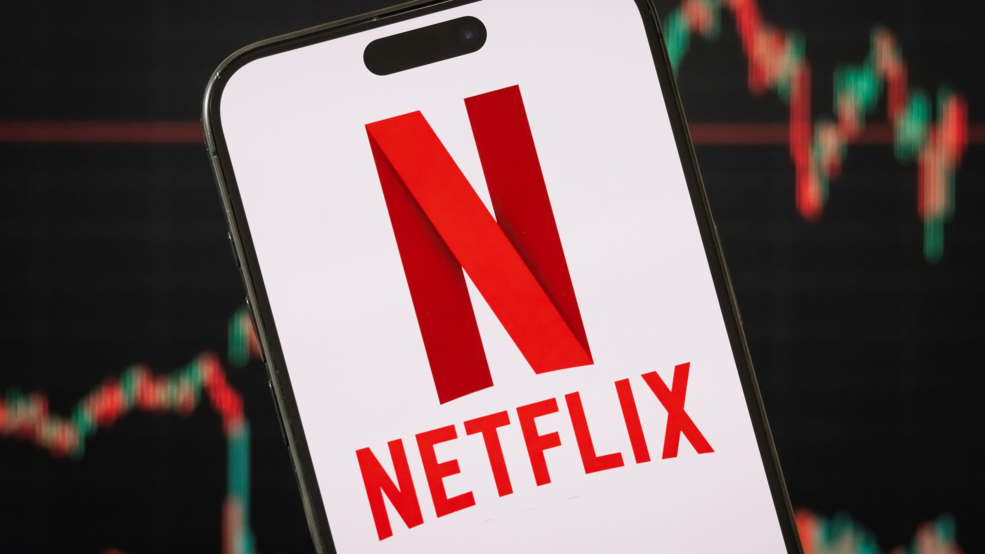 A Netflix logo on a phone.