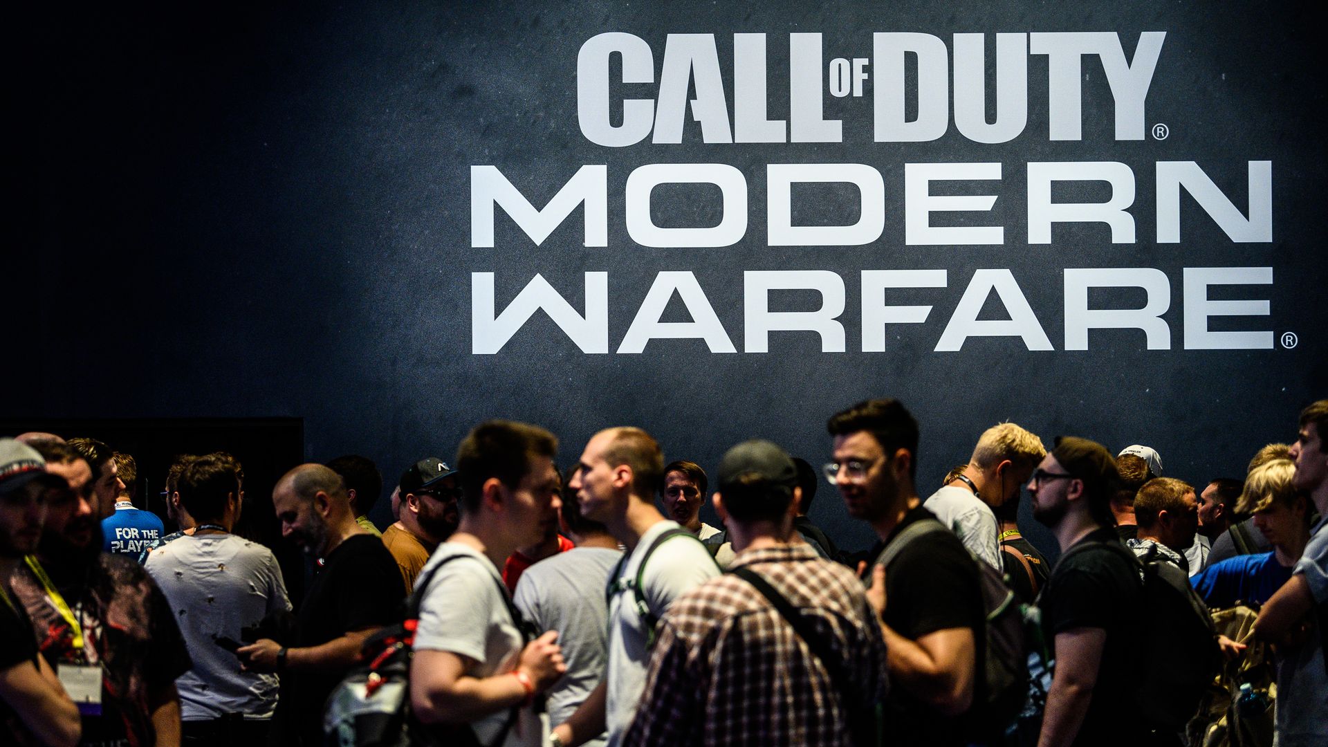 Visitors wait to try out the latest version of Call of Duty Modern Warfare