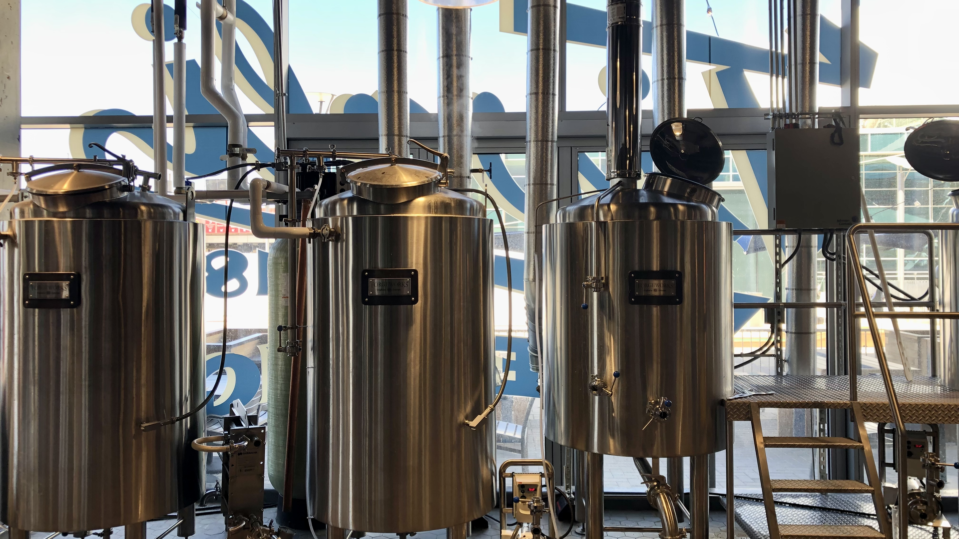 Tivoli Brewing's tanks at its Westin Hotel location at the Denver airport. Photo: John Frank/Axios