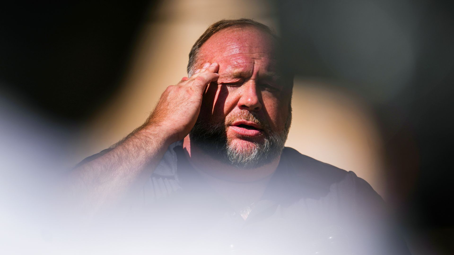 nfoWars founder Alex Jones speaks to the media outside Waterbury Superior Court during his trial on September 21, 2022 in Waterbury, Connecticut.