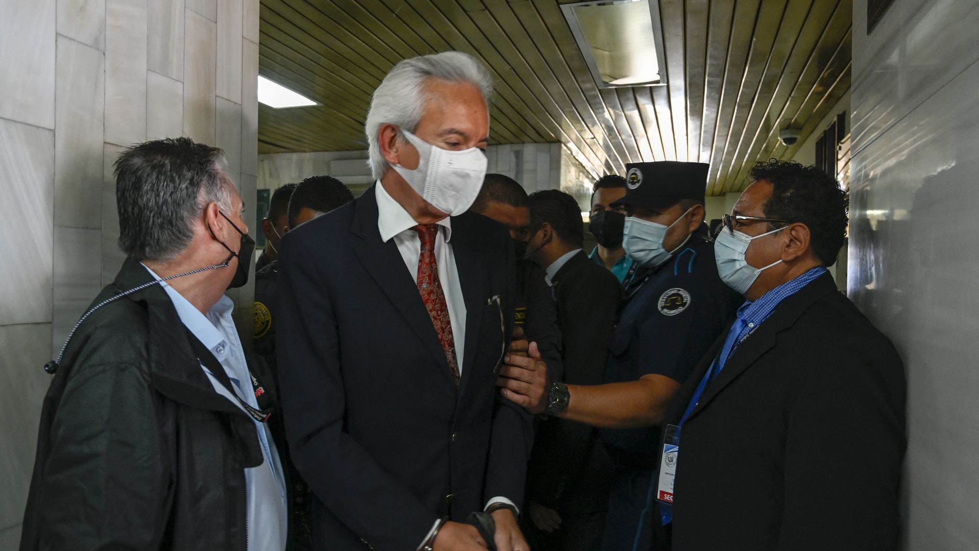 Newspaper publisher José Rubén Zamora (center) in court this month. Photo: Johan Ordóñez/AFP via Getty Images