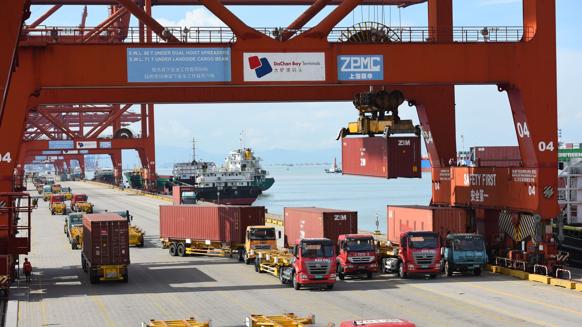 Trucks transport containers at Dachan Bay Terminals in Shenzhen, Guangdong Province of China. Photo: VCG