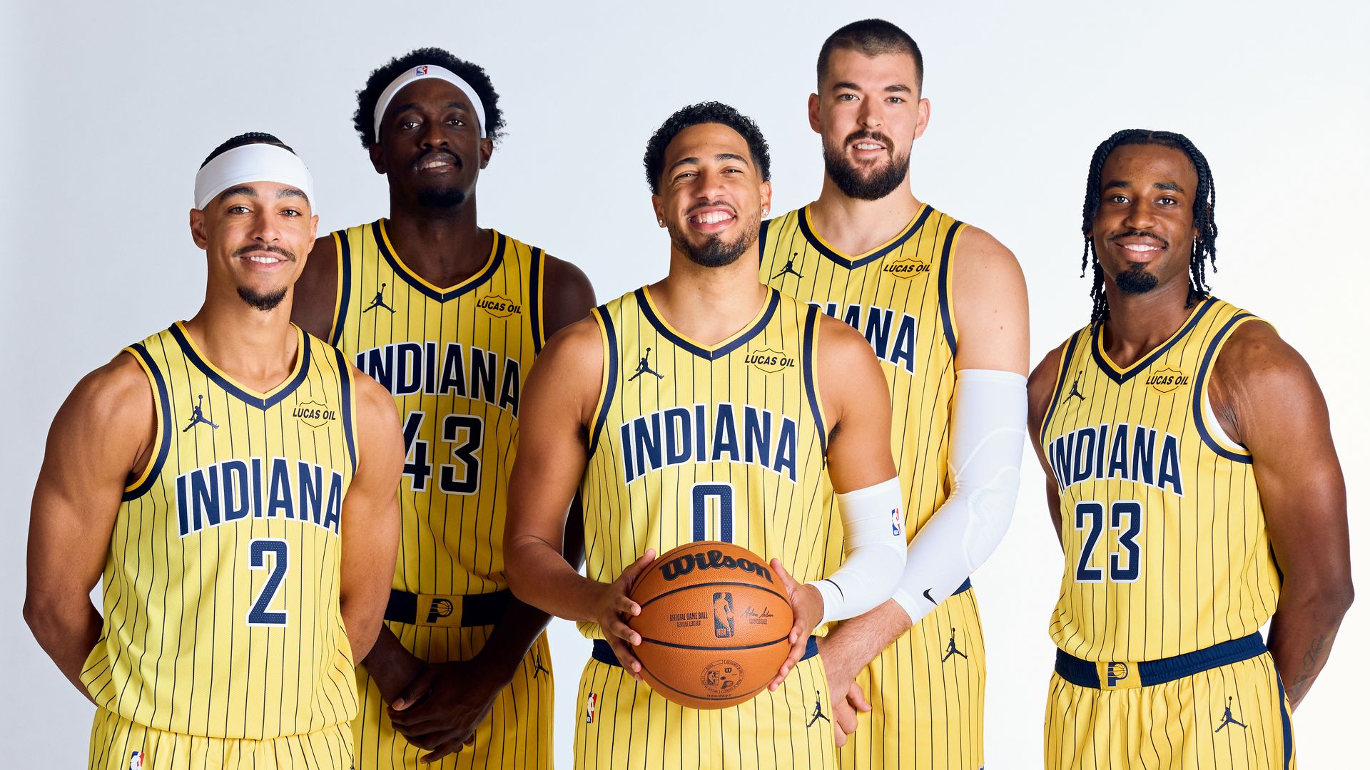 Andrew Nembhard #2, Pascal Siakam #43, Tyrese Haliburton #0, and Ivica Zubac #40, and Aaron Nesmith #23 of the Indiana Pacers pose for a portrait during NBA media day on September 28, 2026 at Gainbridge Fieldhouse in Indianapolis, Indiana.