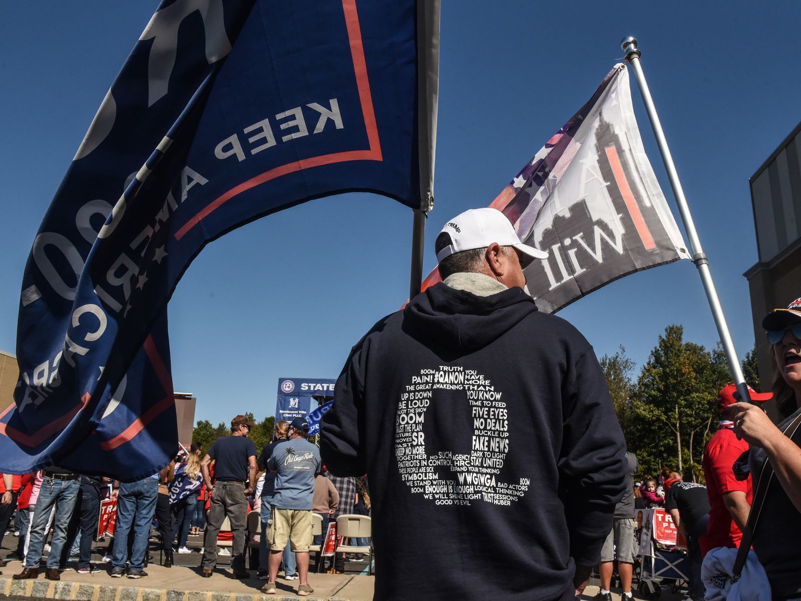 Facebook bans QAnon across all its platforms