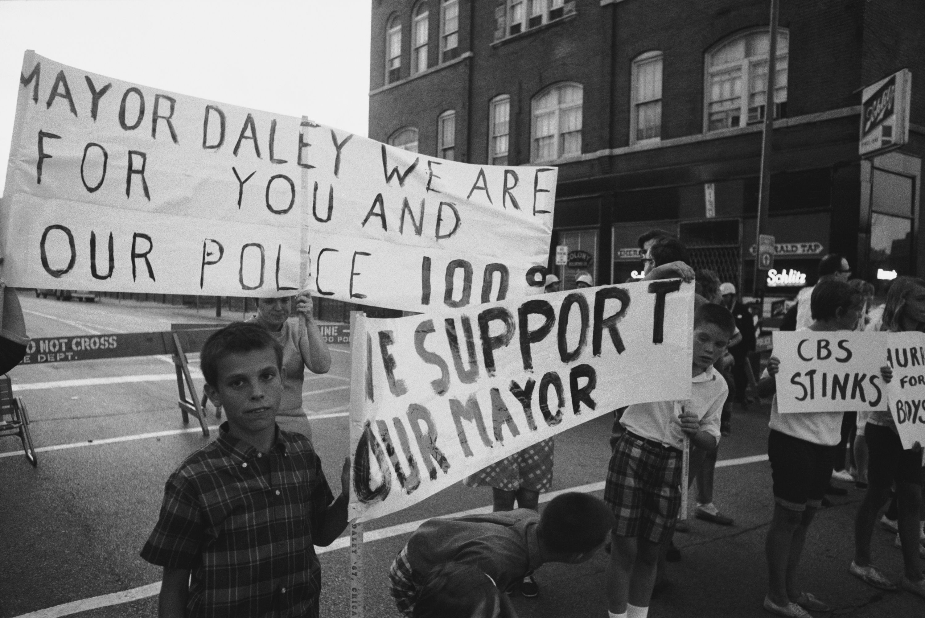 Photo of people protesting on the street 