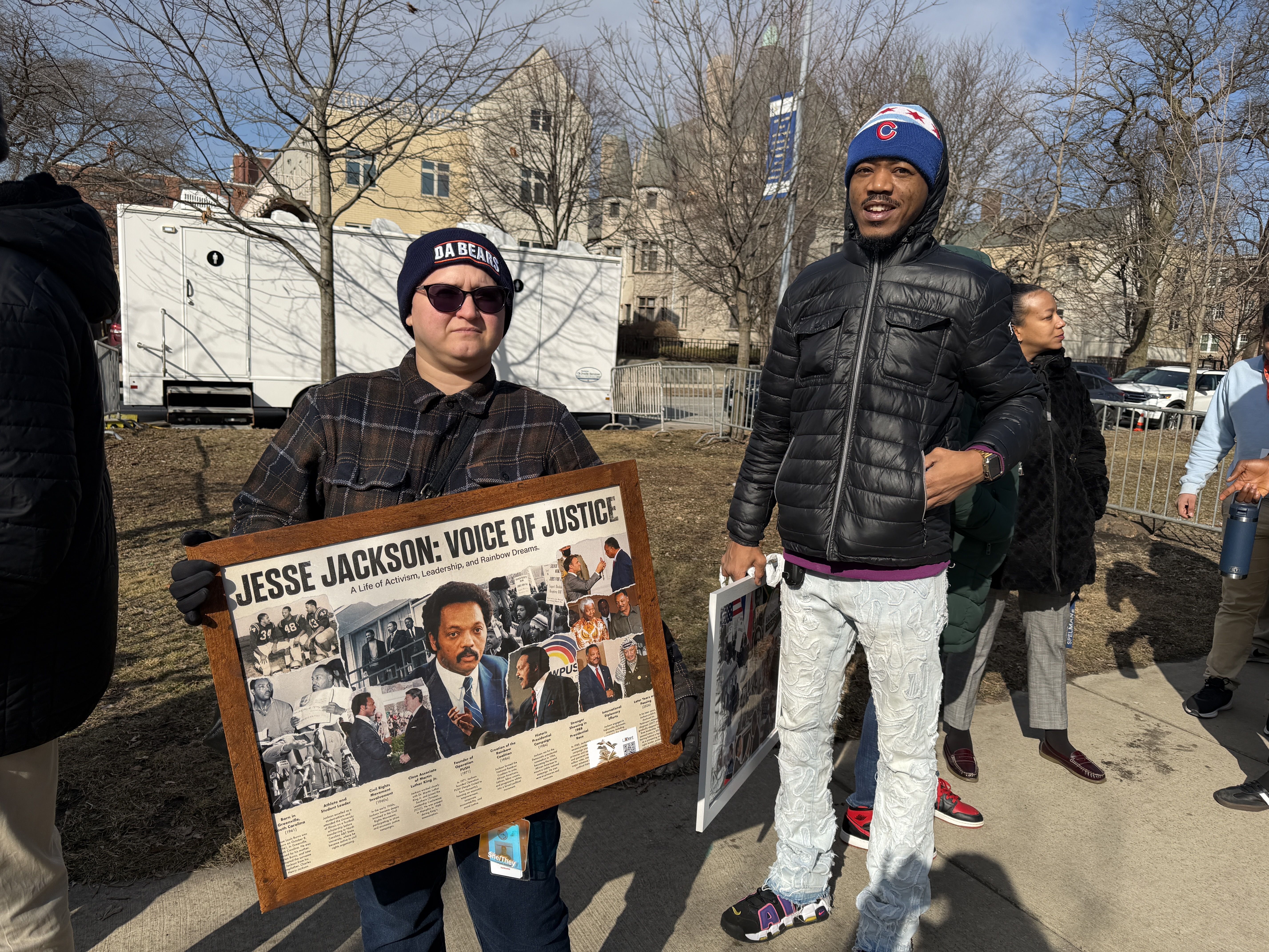 person holding a poster in line 
