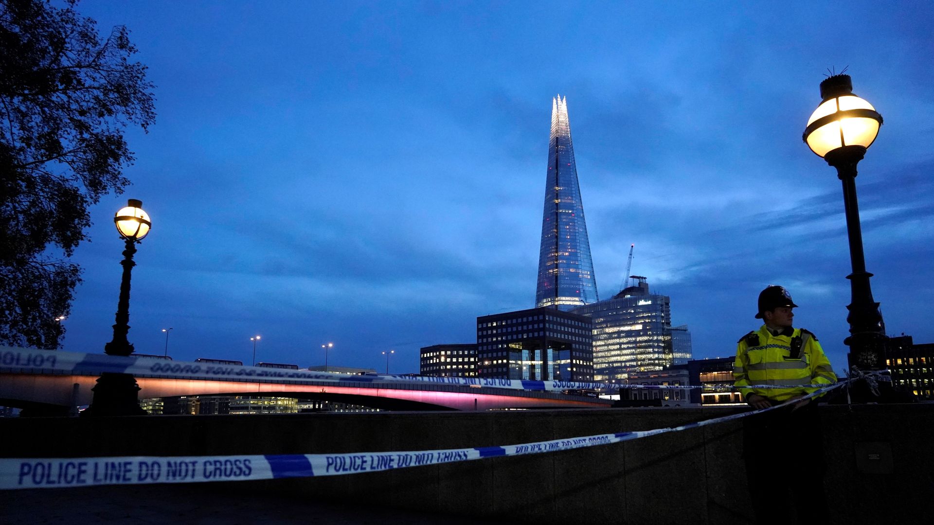A police officers patrols near London Bridge in London, on November 30