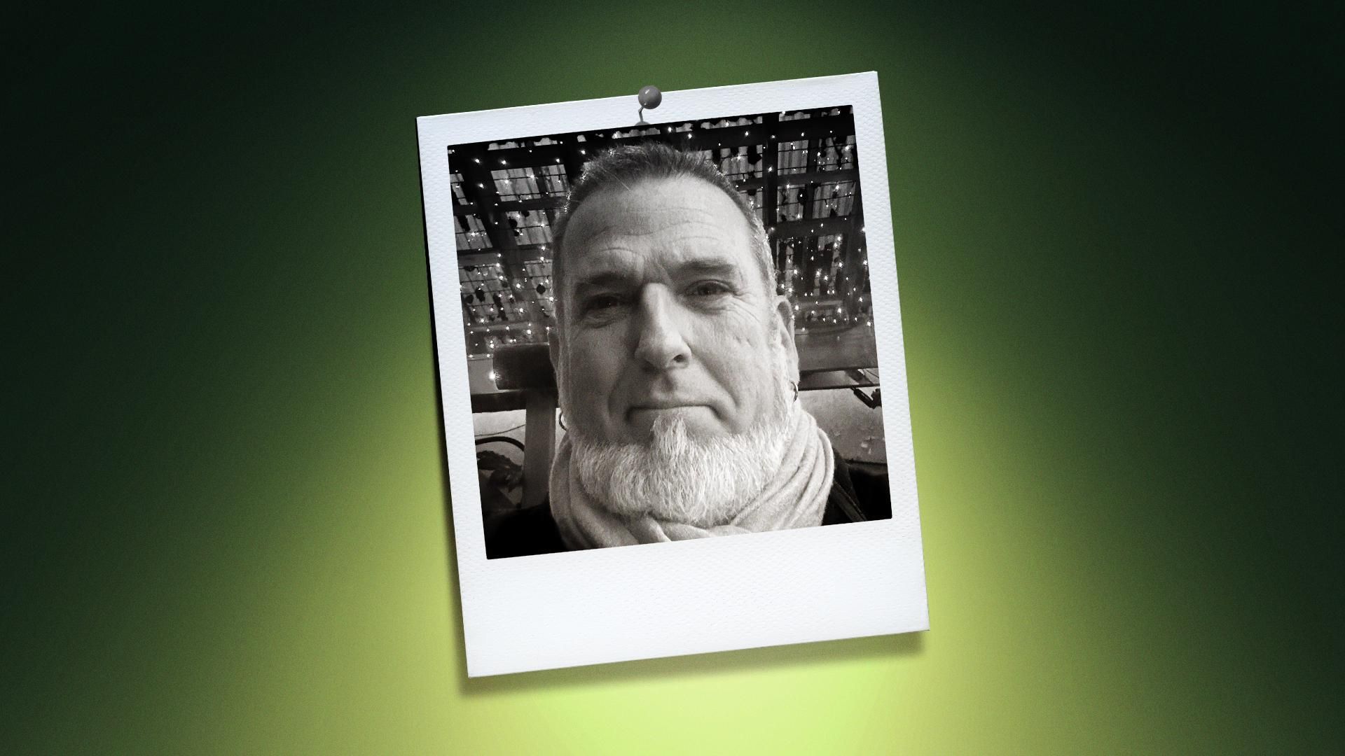 A headshot in a poloroid style photo of donovan zimmerman