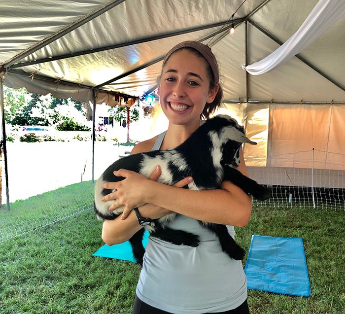 holding goat for yoga charlotte