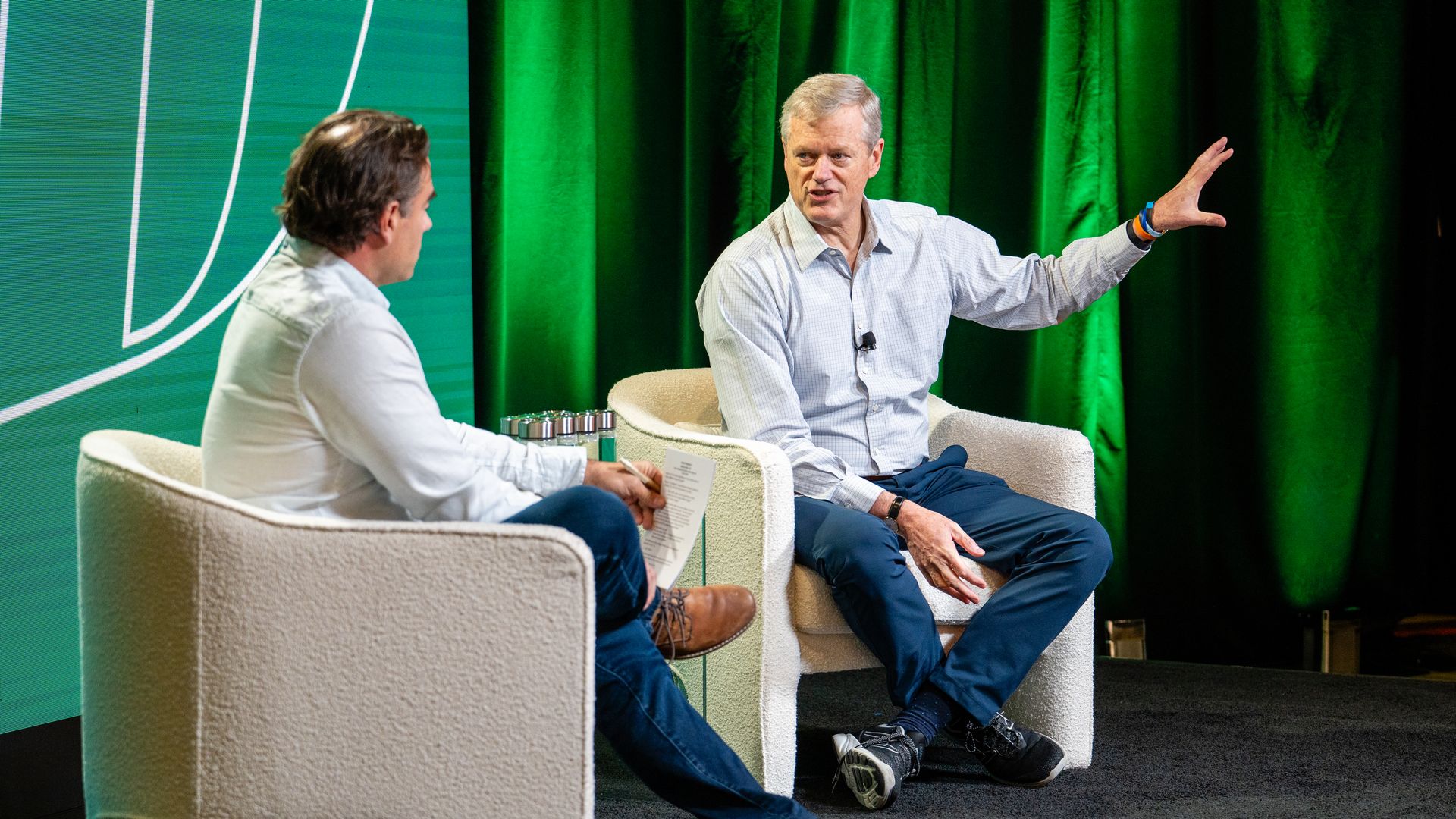 Dan Primack and Charlie Baker on stage at Axios BFD, Oct. 22, 2024