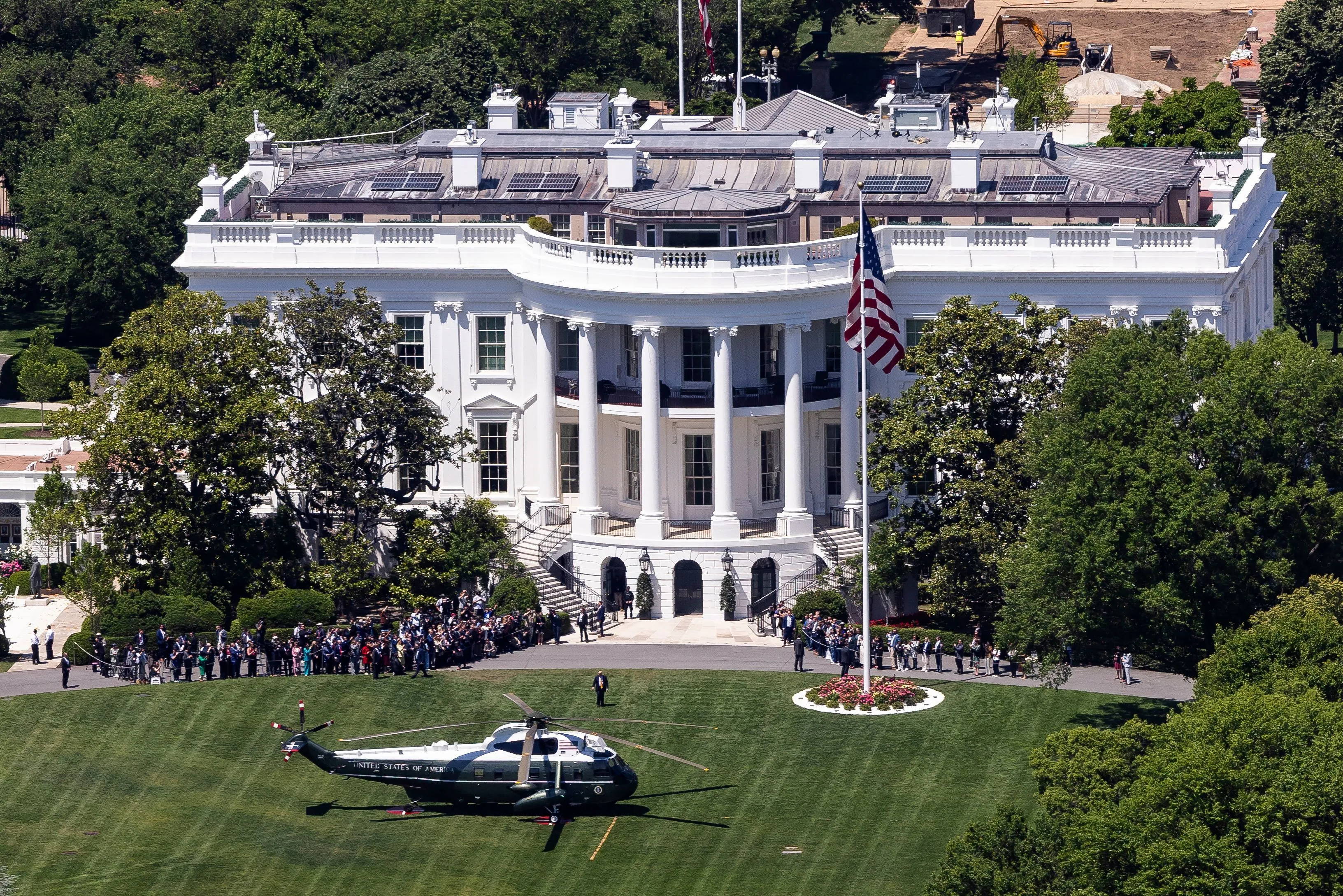 President Trump walks across the South Lawn to Marine One last week as he leaves for China. 