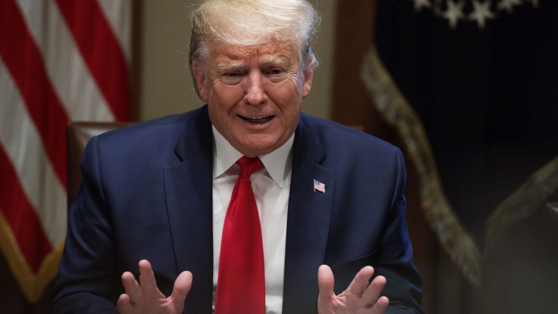 Donald trump at a desk