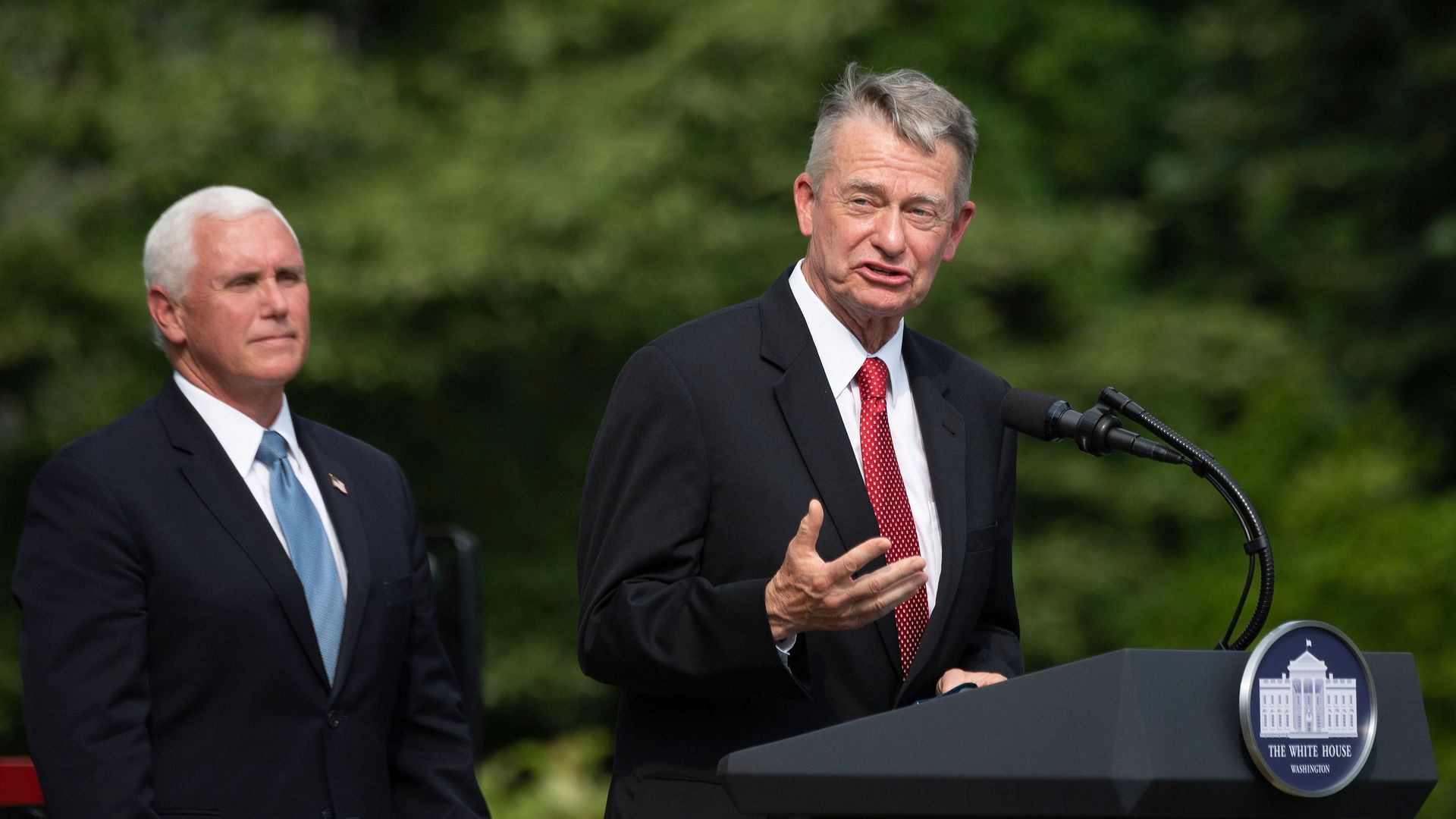 Picture of Idaho Gov. Brad Little in 2016, with former Vice President Mike Pence standing behind him
