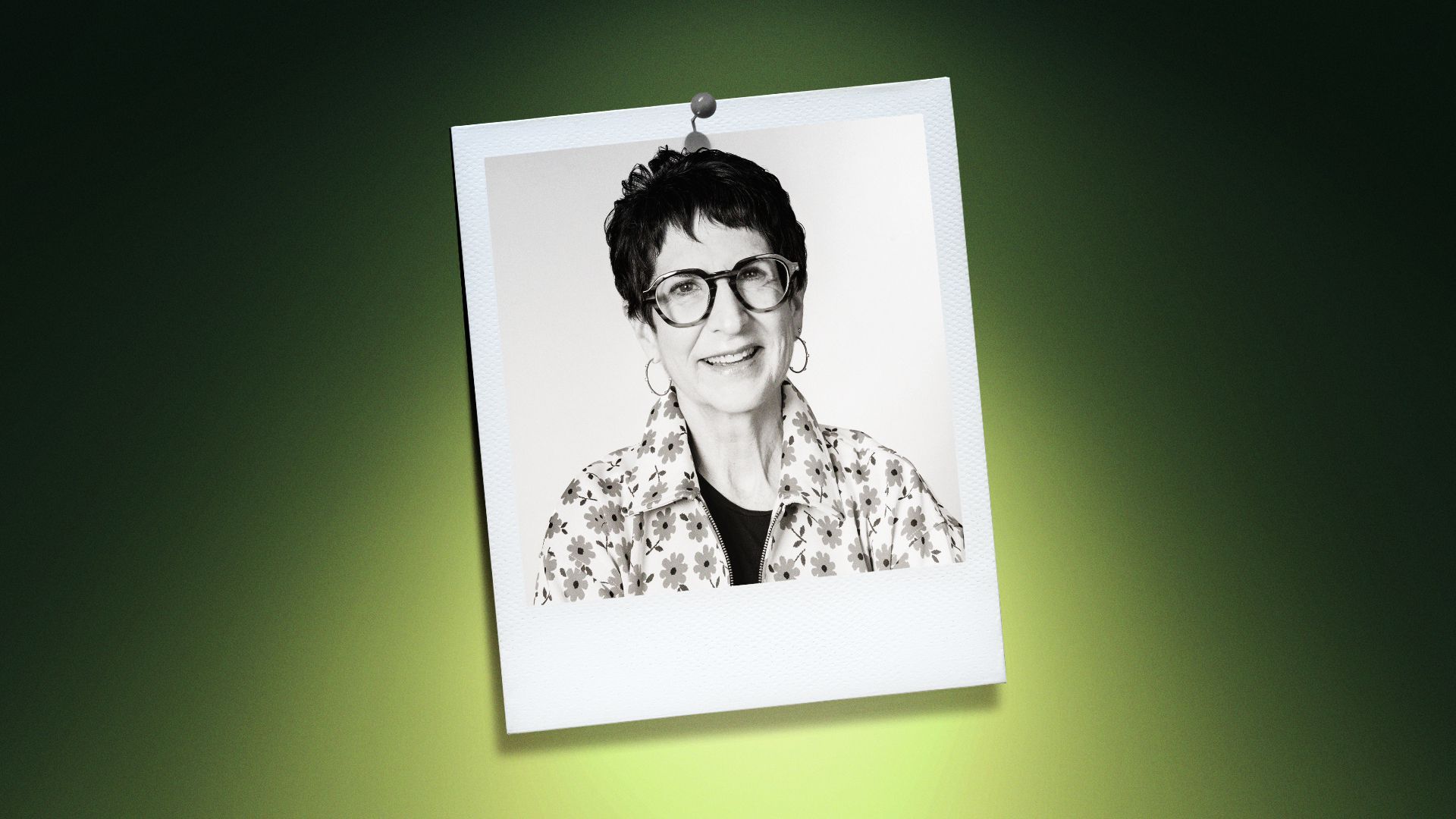 Photo illustration of Marcie Cohen Ferris in the center of a Polaroid photo under a green spotlight.
