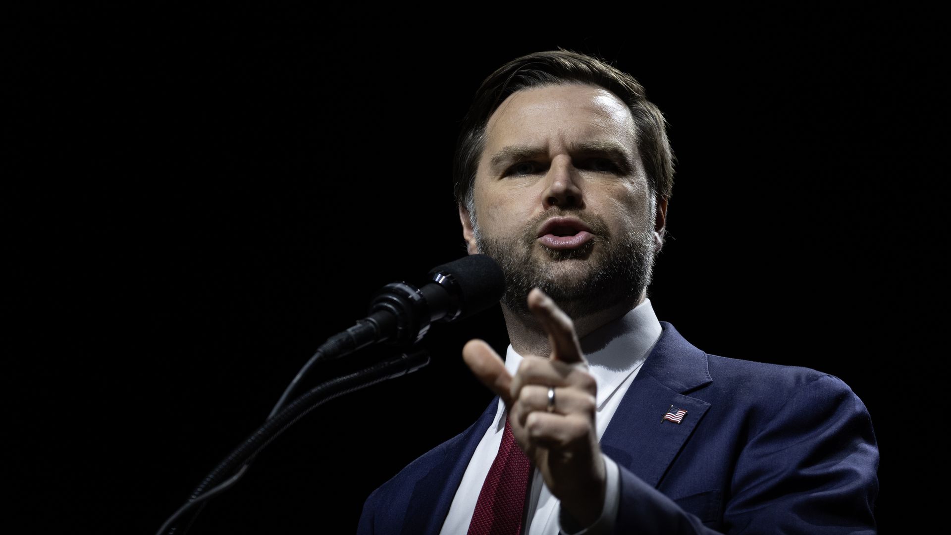 Sen. J.D. Vance (R-OH) speaks to supporters during a rally at the FIM Capital Theatre on November 4, 2024 in Flint, Michigan. Republican presidential nominee former President Donald Trump is also scheduled to hold a rally on this election eve in Michigan, which is considered a critical battleground