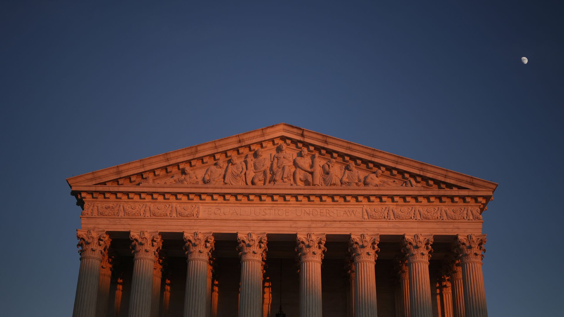 Photo of the Supreme Court building's top triangular facade