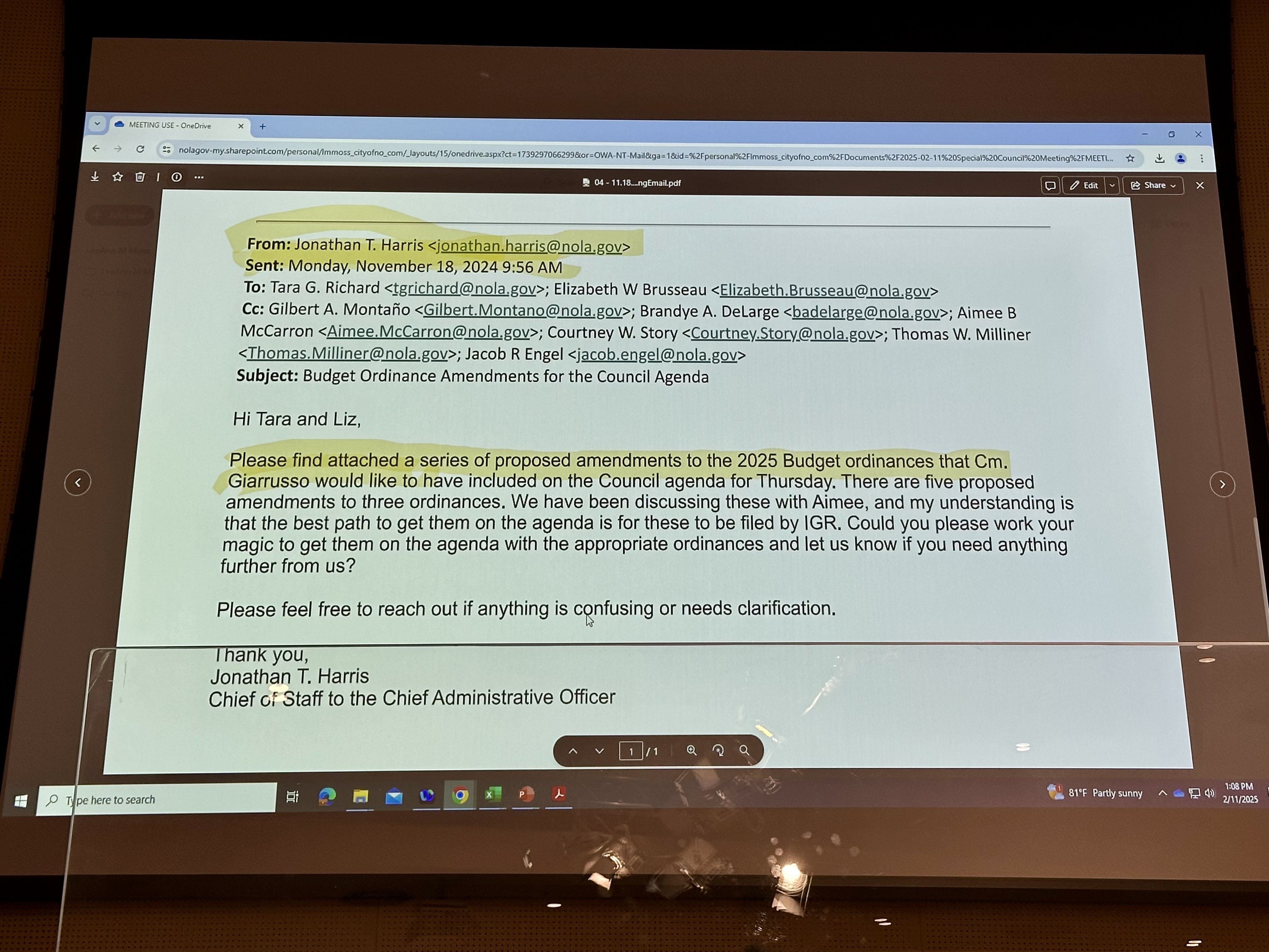 Photo shows a screenshot of emails.