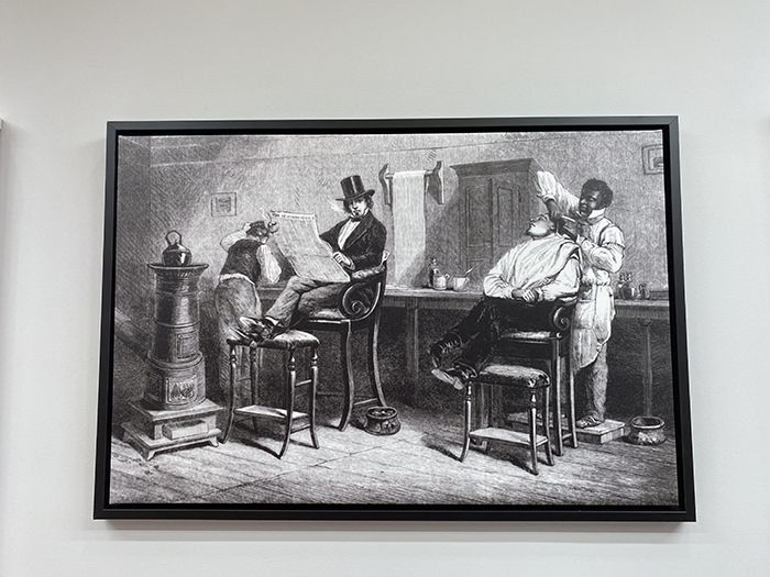 print of 19th century barbershop hanging in No Grease SouthPark