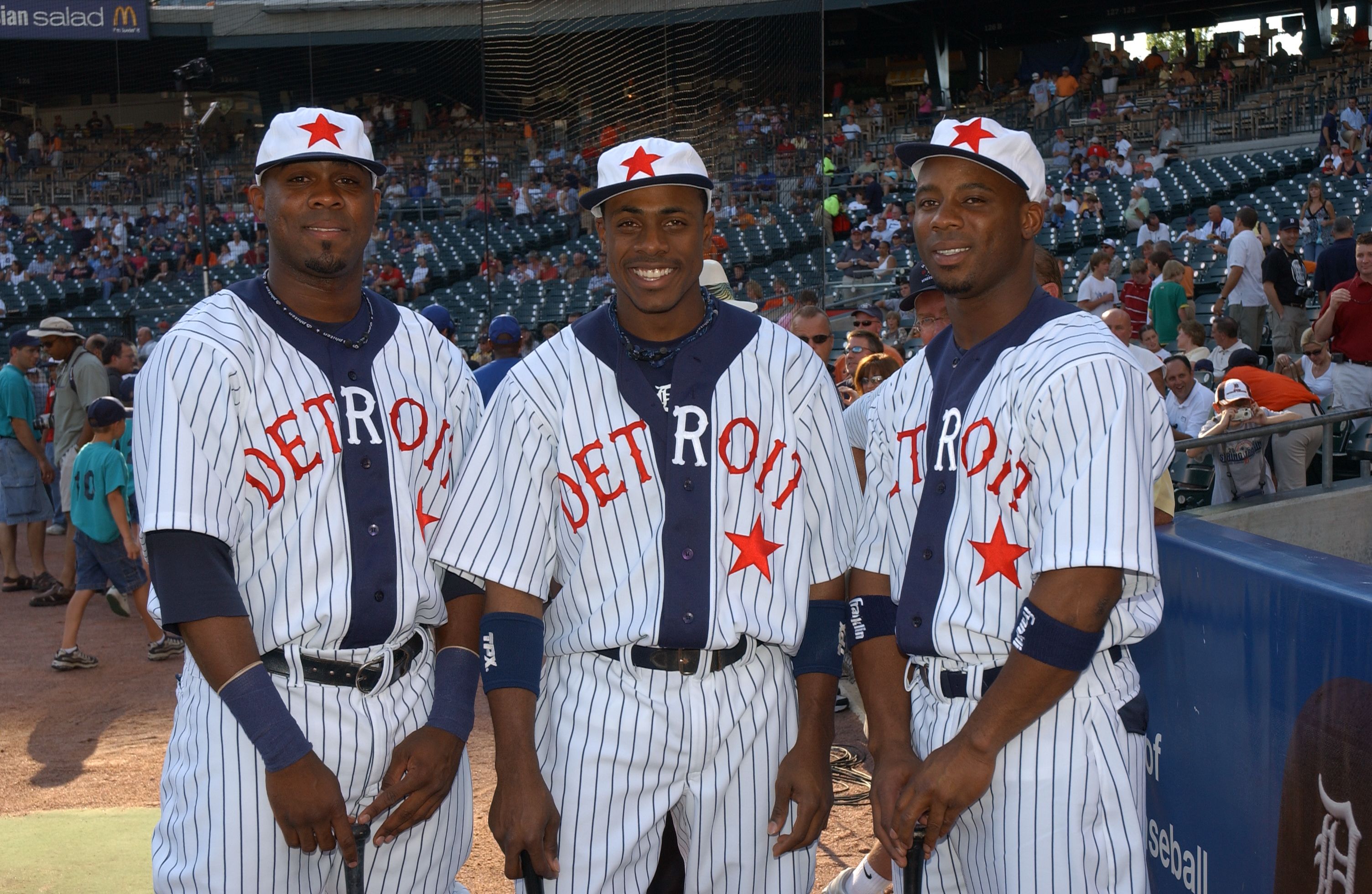  Marcus Thames, Curtis Granderson and Craig Monroe of the Detroit Tigers show off their Detroit Stars Negro League uniforms prior to the game against the Kansas City Royals at Comerica Park in Detroit, Michigan on July 15, 2006. The Tigers defeated the Royals, 6-0.