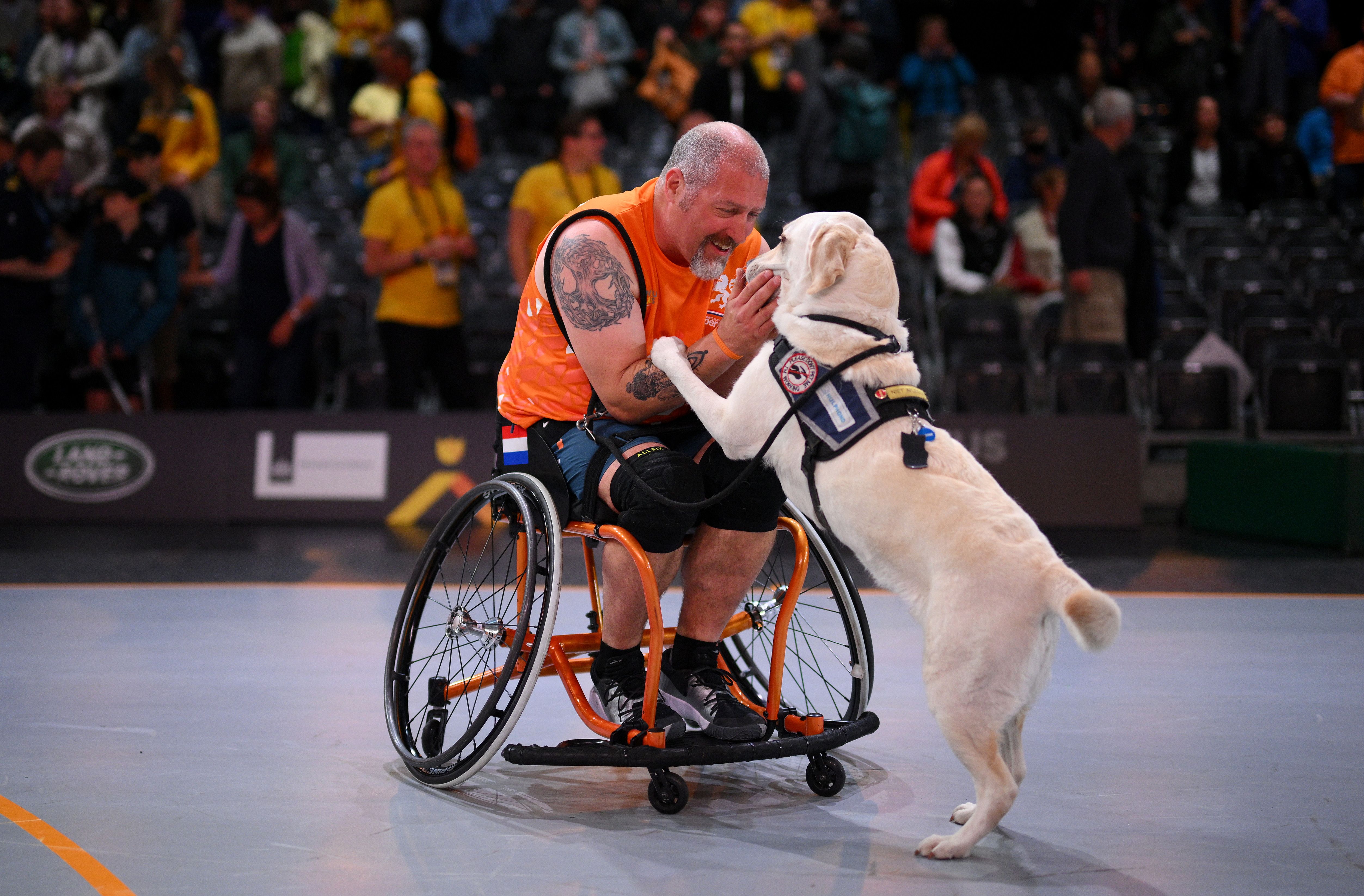 Wheelchair athlete with his dog