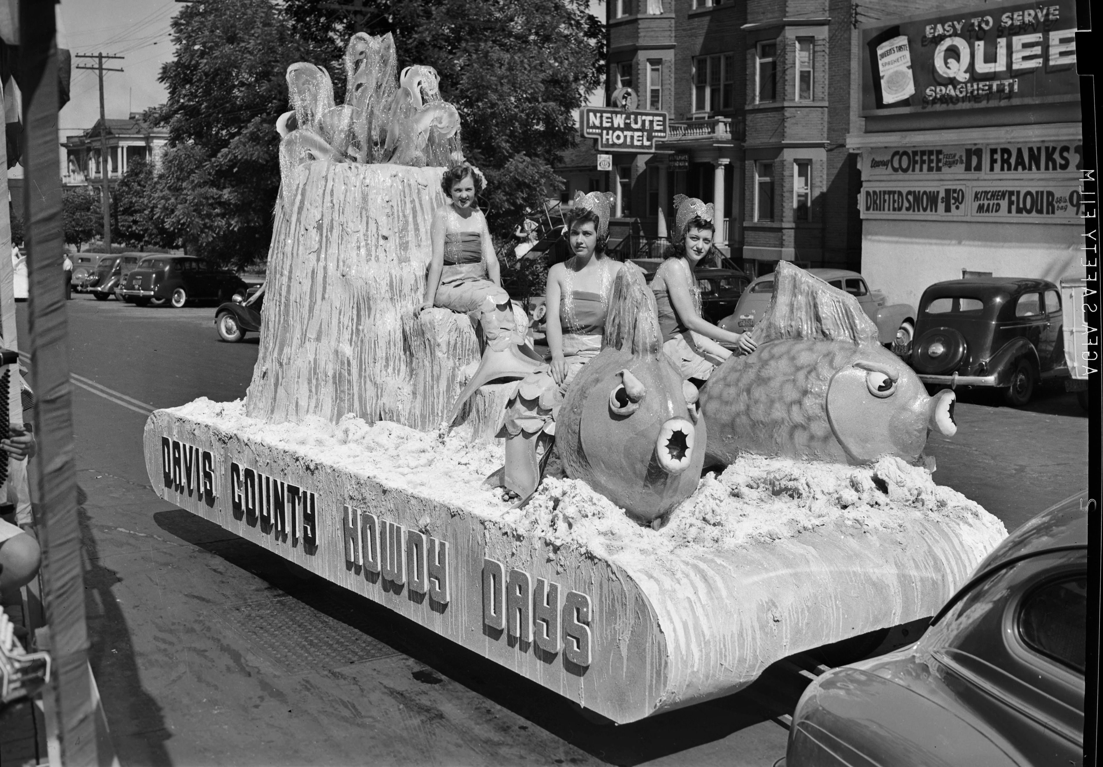 Women dressed as mermaids on a parade float in 1940.