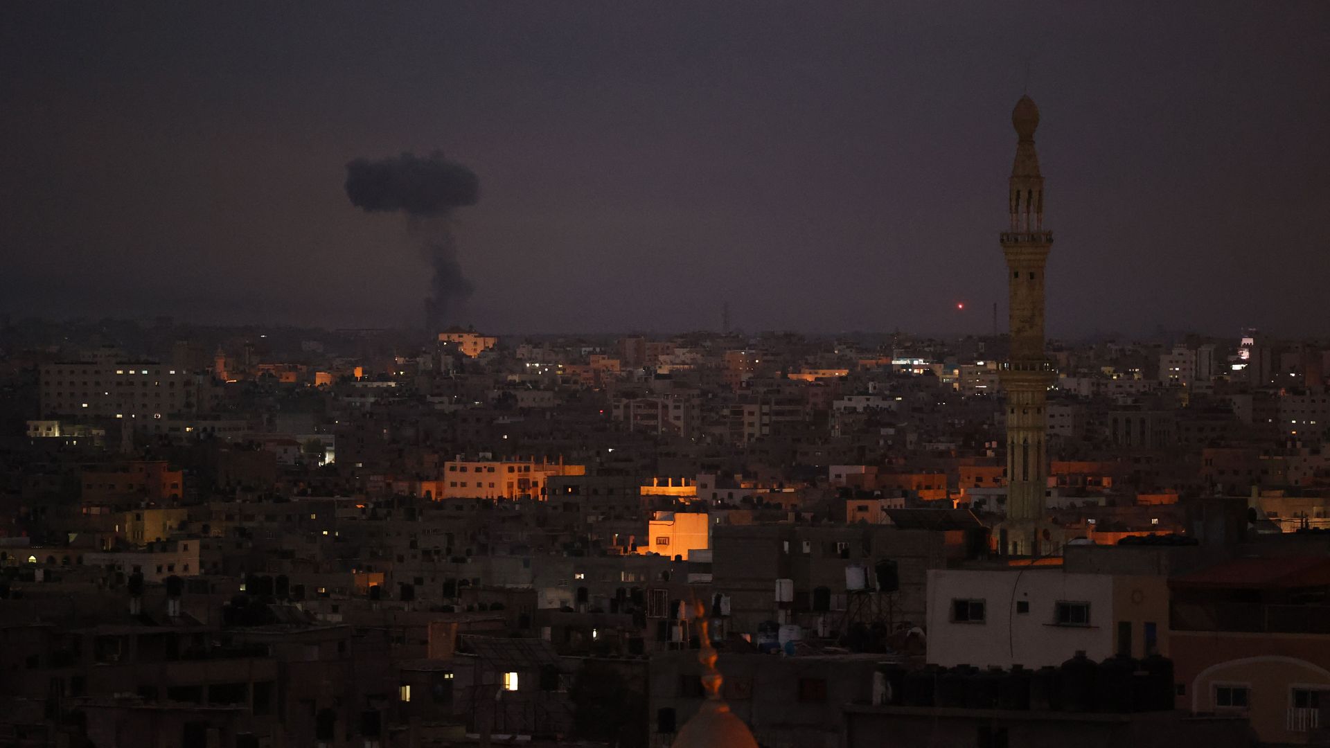  Smoke billows following an Israeli airstrike at Gaza City on May 20
