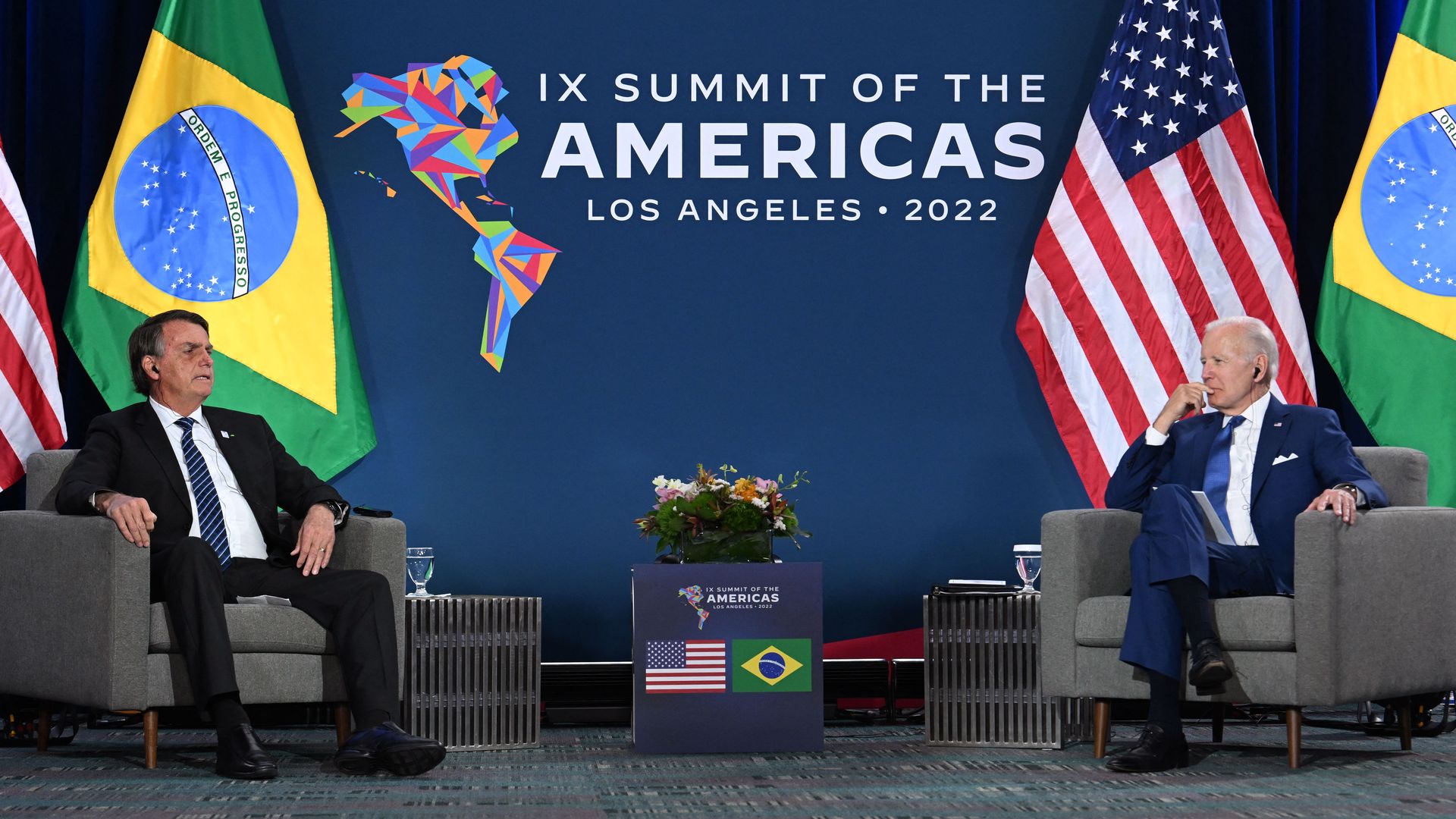US President Joe Biden (R) and Brazilian President Jair Bolsonaro attend a bilateral meeting at the 9th Summit of the Americas in Los Angeles, California, June 9.