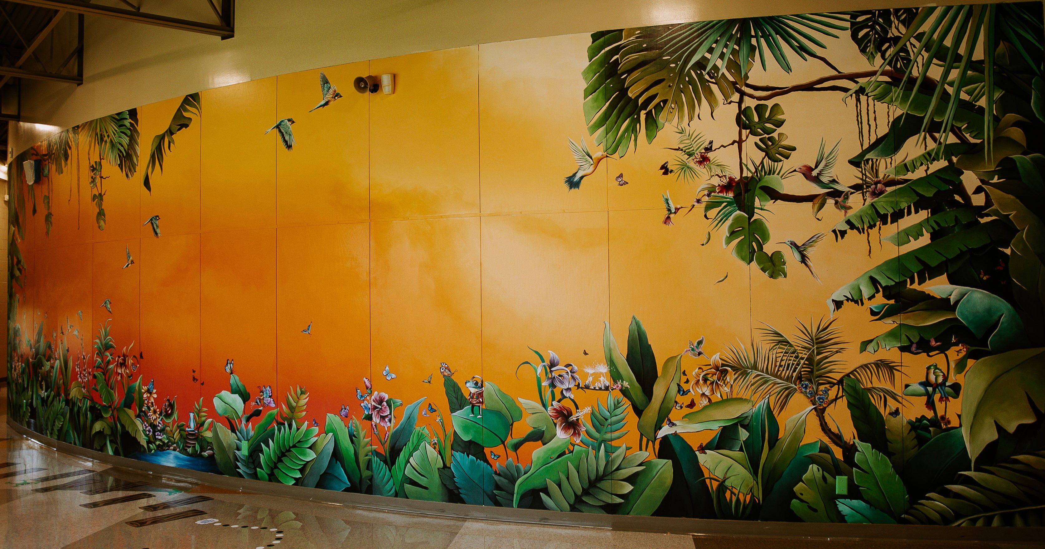 wall mural with jungle leaves and birds