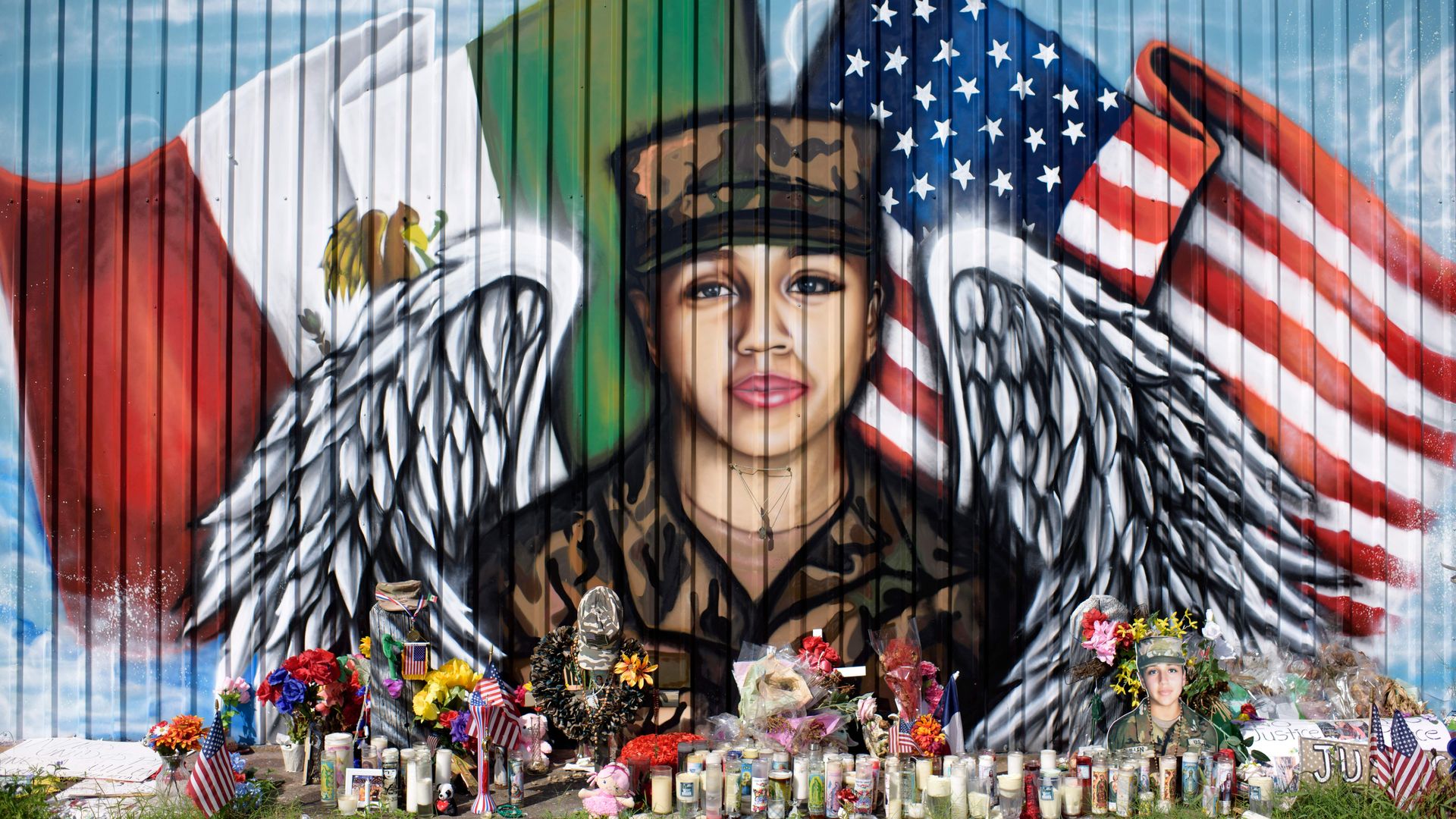 Candles and flowers decorate a makeshift memorial for US Army Specialist Vanessa Guillen 
