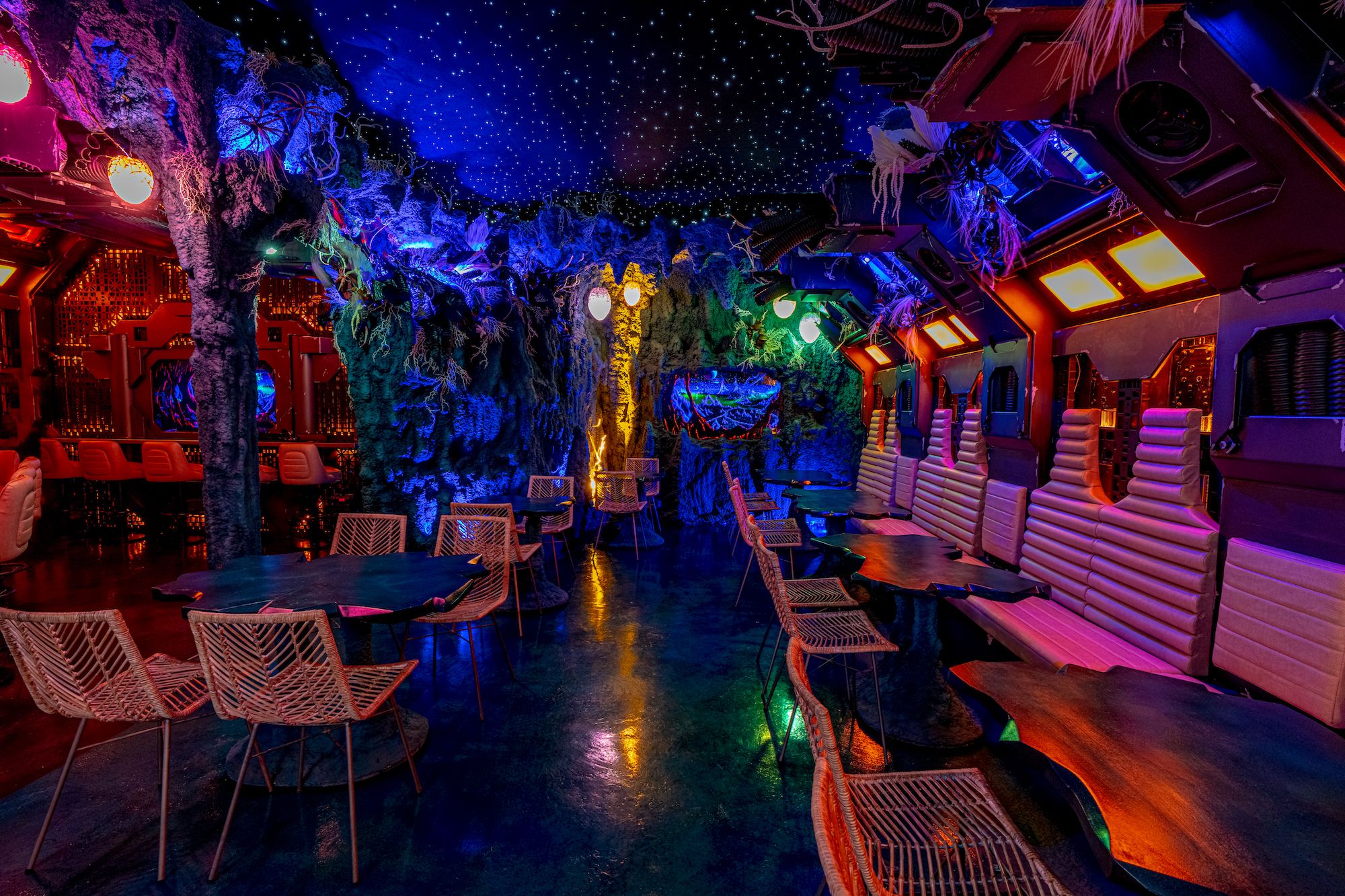 The glowing interior of a sci-fi, spaceship-themed tiki bar.