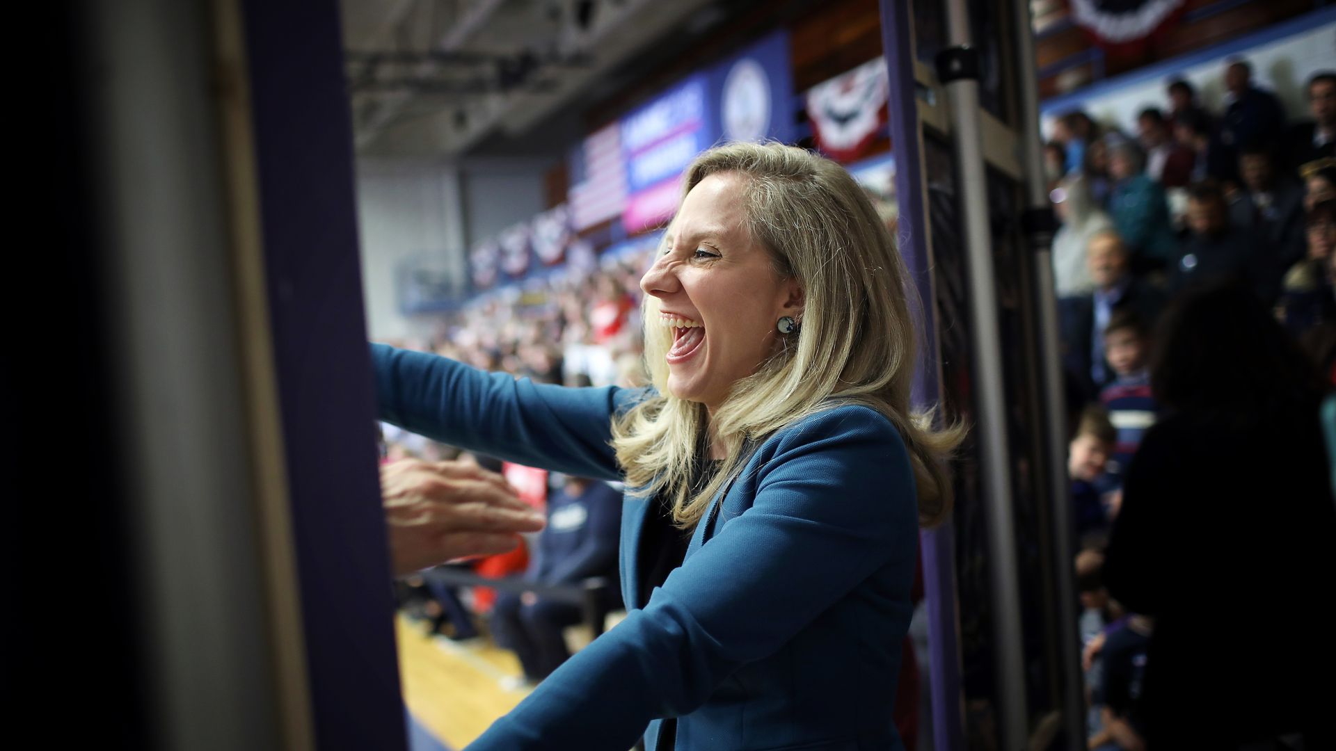 Abigail Spanberger reacts as she sees a former school teacher at an election eve rally at her high school alma mater John R. Tucker High School November 5, 2018 in Richmond, 