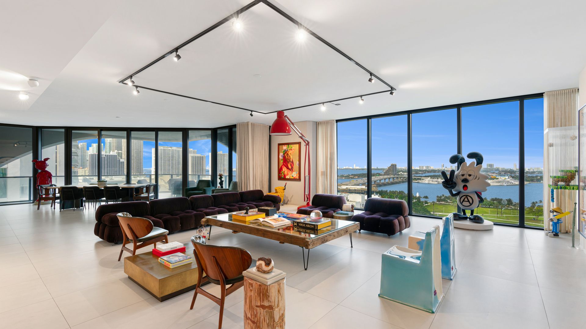 The salon at David and Isabela Grutman condo, with panoramic views to Biscayne Bay and city vistas.