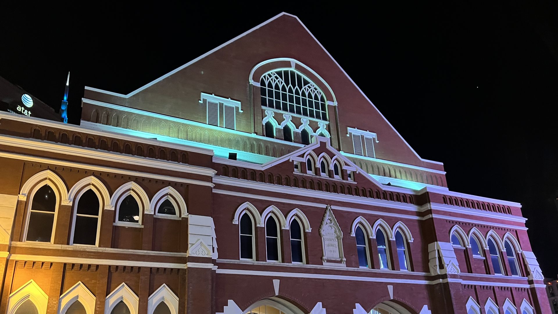exterior of the Ryman Auditorium at night.
